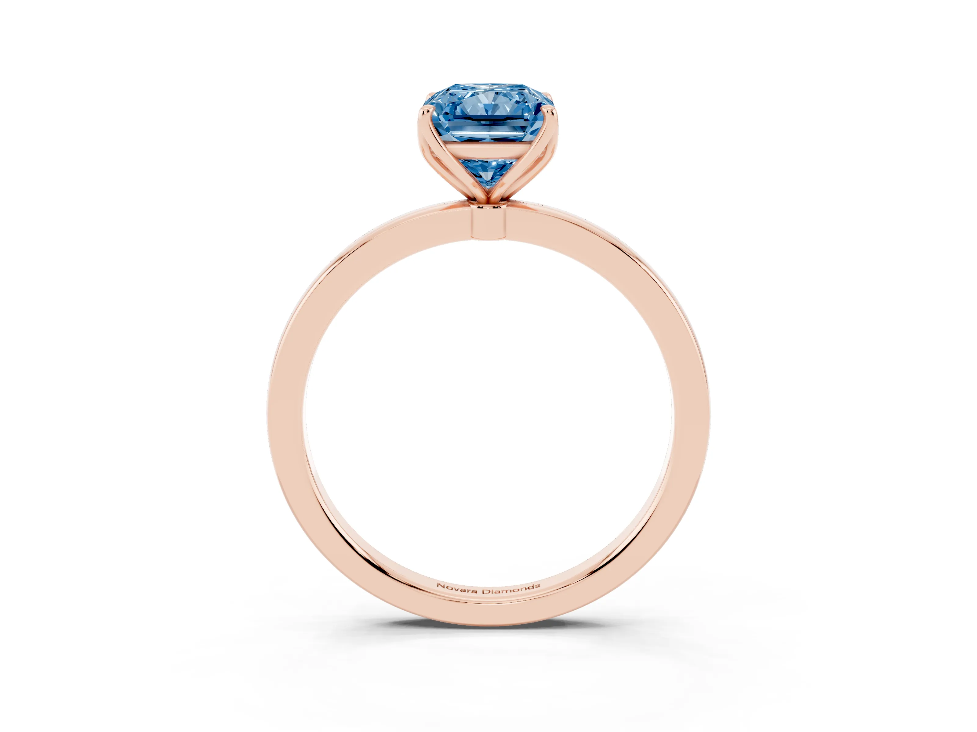 Fancy Blue Radiant Cut Diamond Solitaire Ring Set in Rose gold with Prong Setting and Thin Polished Band