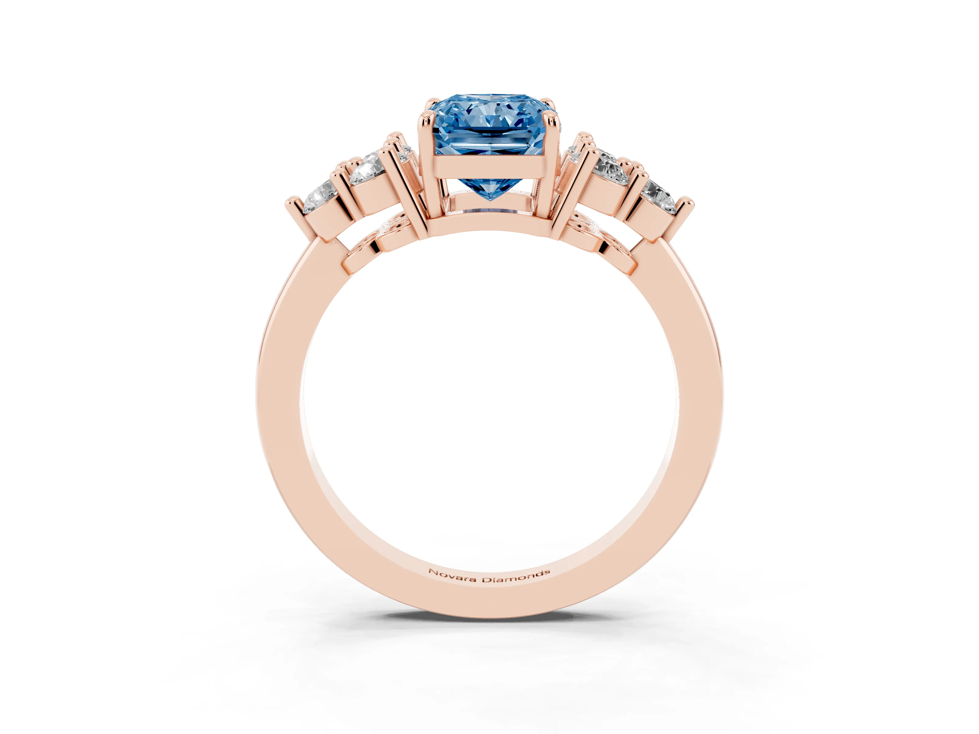 Fancy Blue Radiant Cut Diamond Solitaire Ring Set in Rose gold with Cluster Accents on Each Side