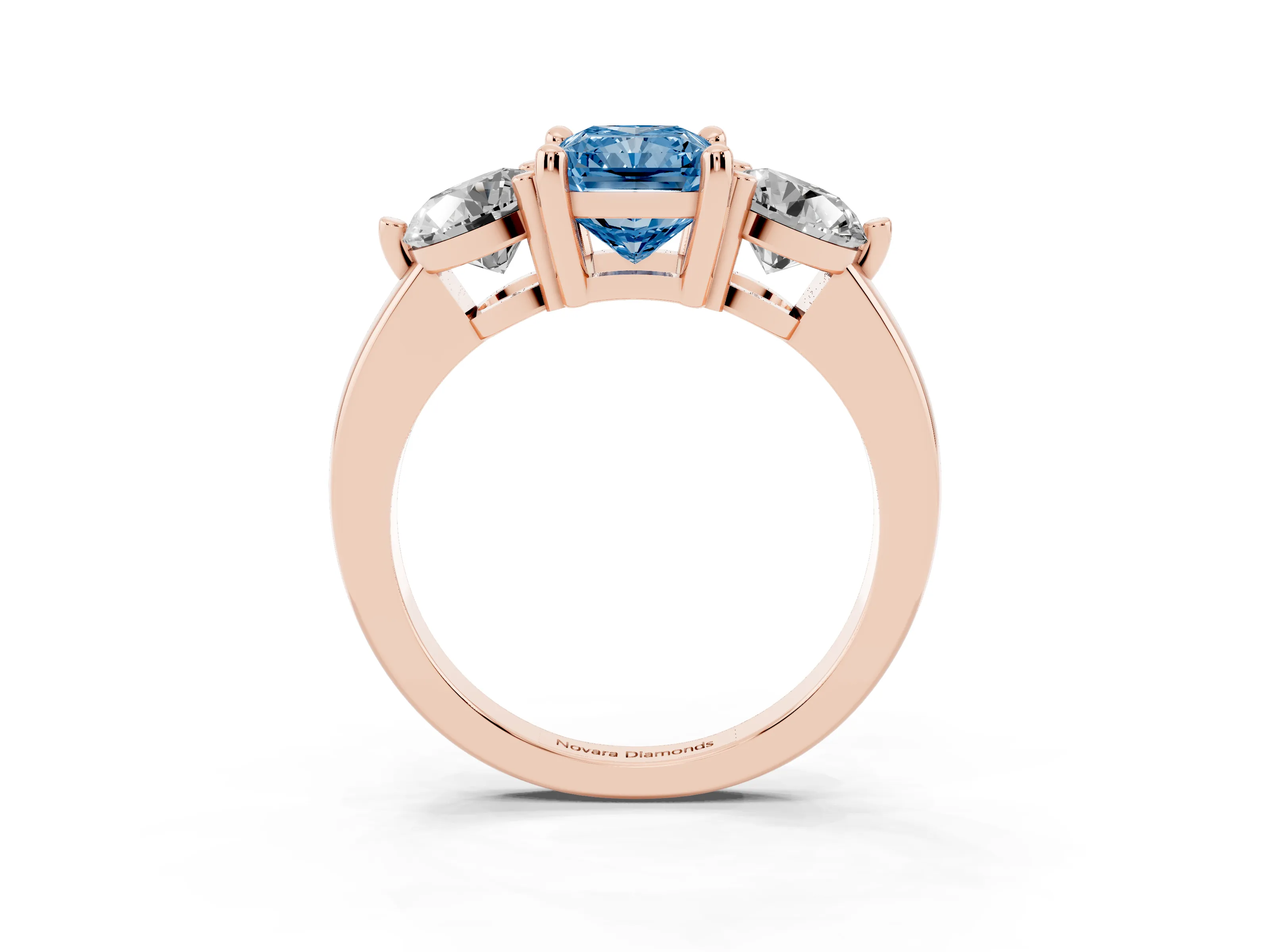 Fancy Blue Radiant Cut Diamond Three-Stone Ring Set in Rose gold with Prong Setting and Classic Band