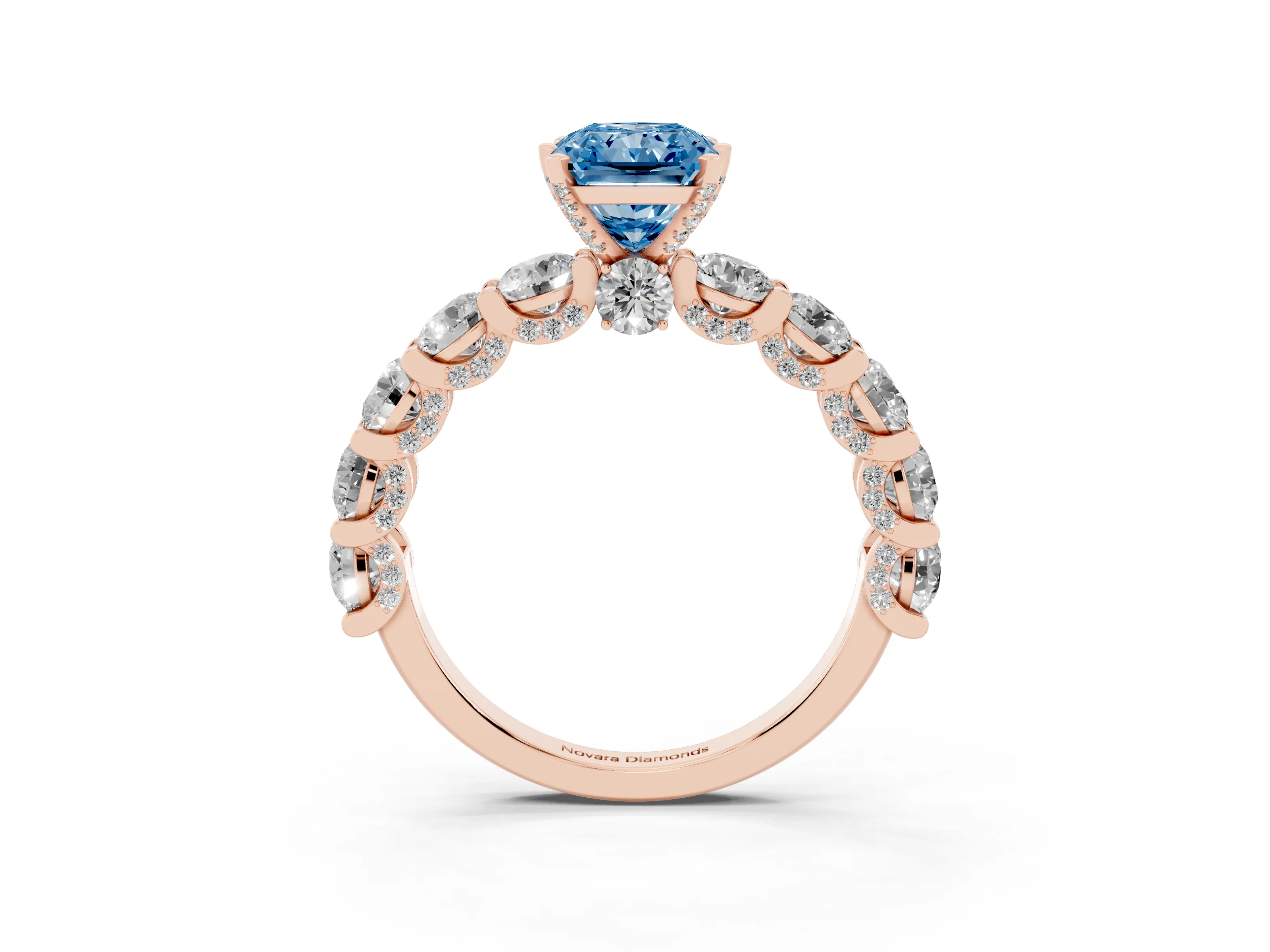 Fancy Blue Radiant Cut Diamond Side Stone Ring Set in Rose gold with Alternating Round and Oval Side Stones