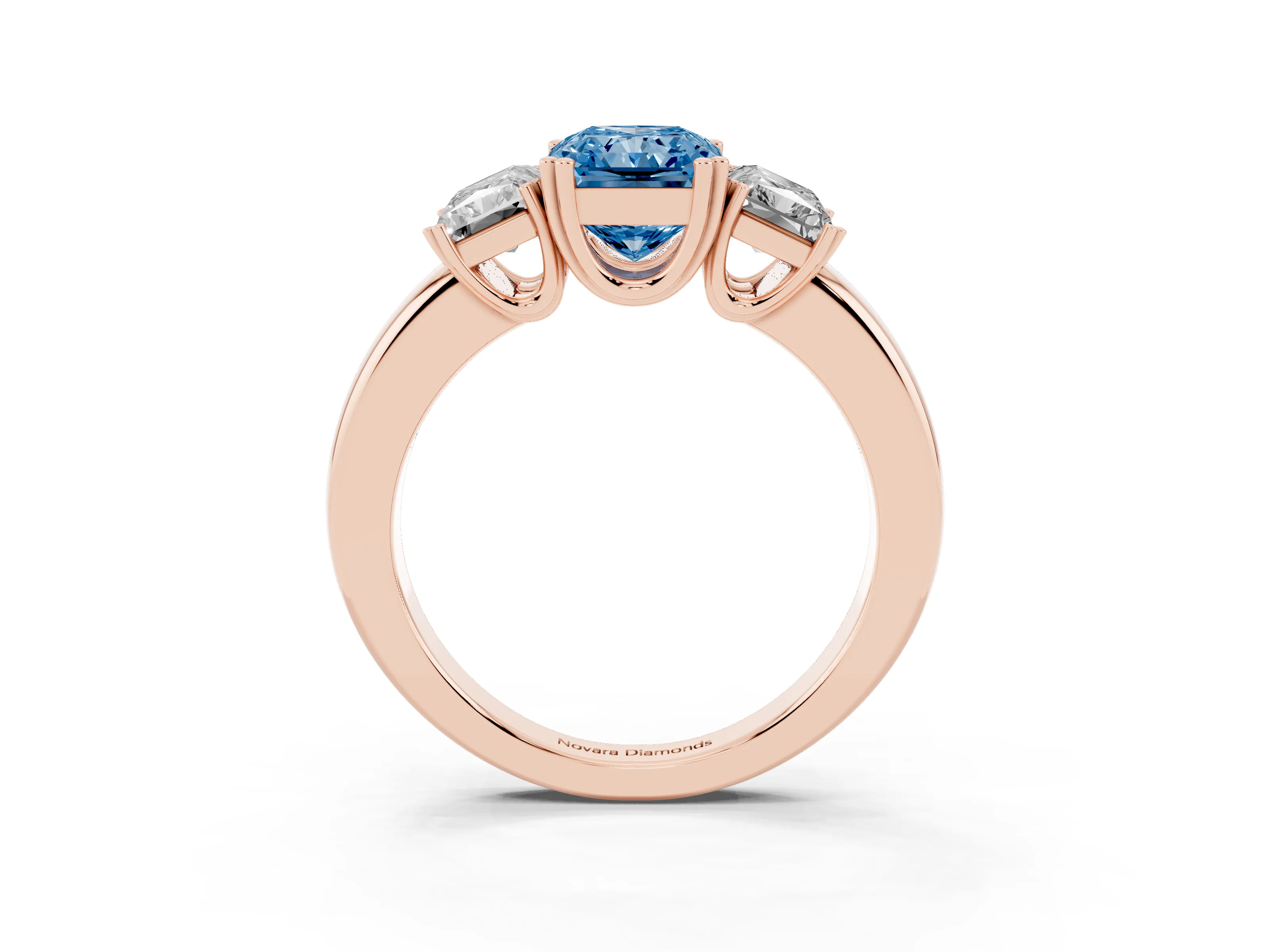 Fancy Blue Radiant Cut Diamond Three-Stone Ring Set in Rose gold with Polished Channel-Set Band