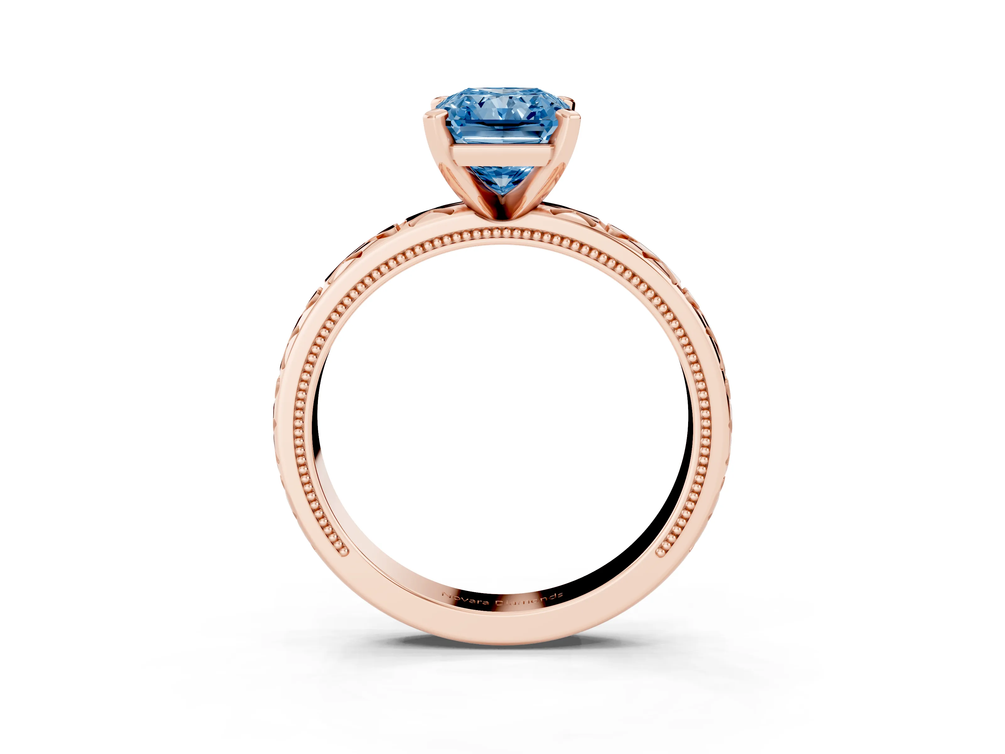 Fancy Blue Radiant Cut Diamond Solitaire Engagement Ring Set in Rose gold with XO Engraved Band and Prong Setting