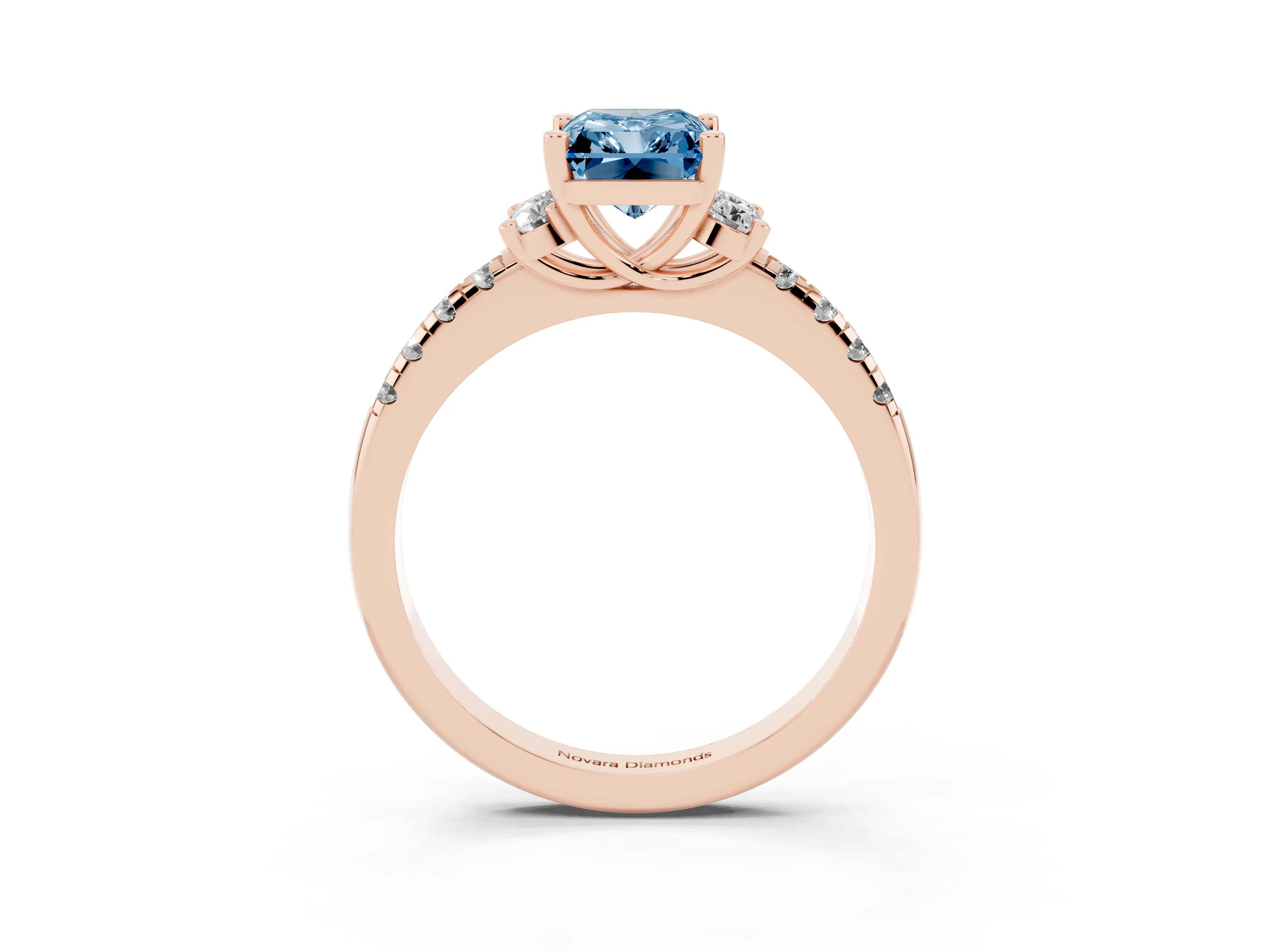 Fancy Blue Radiant Cut Diamond Three-Stone Pavé Ring Set in Rose gold with Prong Setting