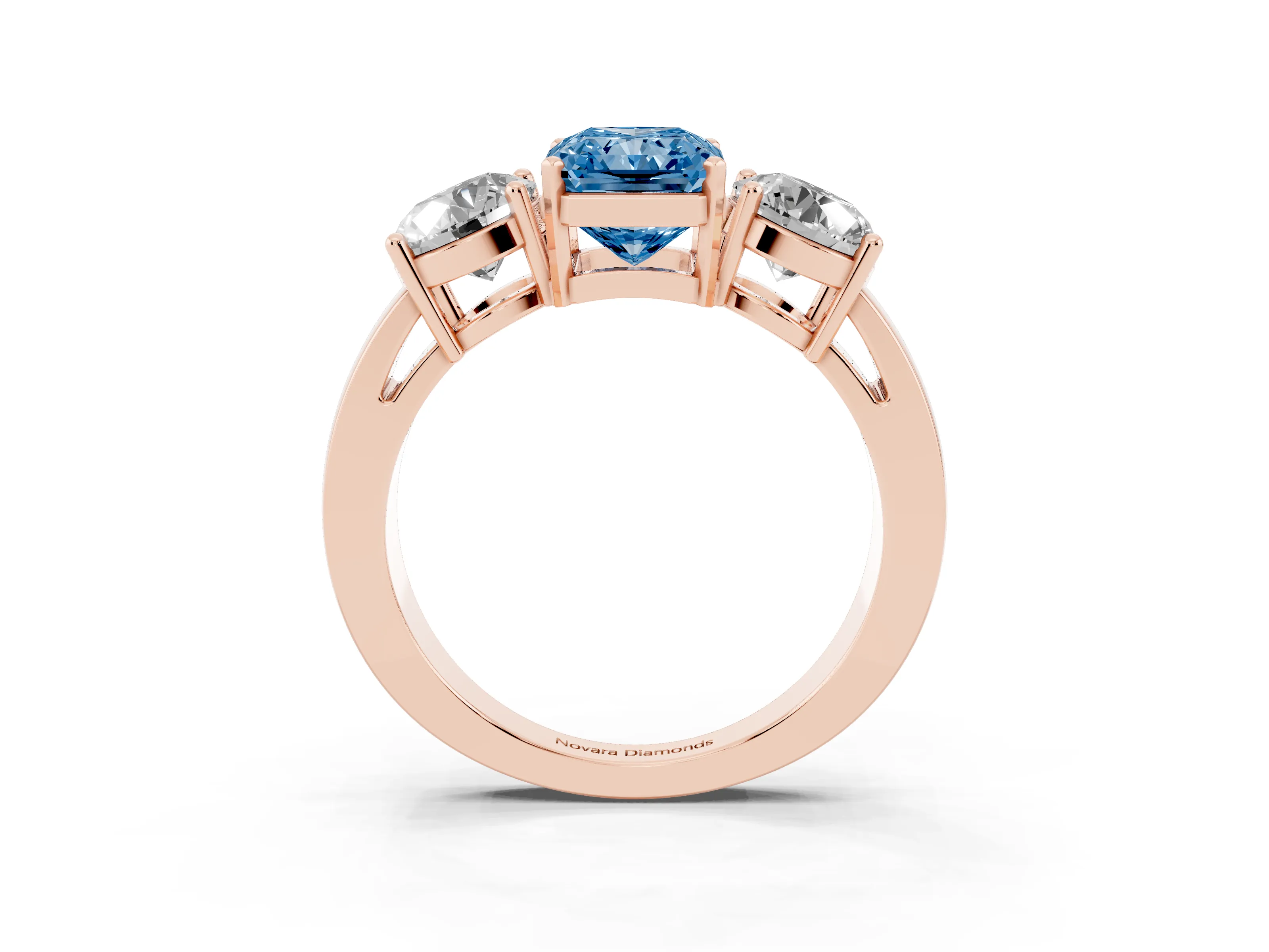 Fancy Blue Radiant Cut Diamond Three-Stone Ring Set in Rose gold with Round Side Stones and Classic Band