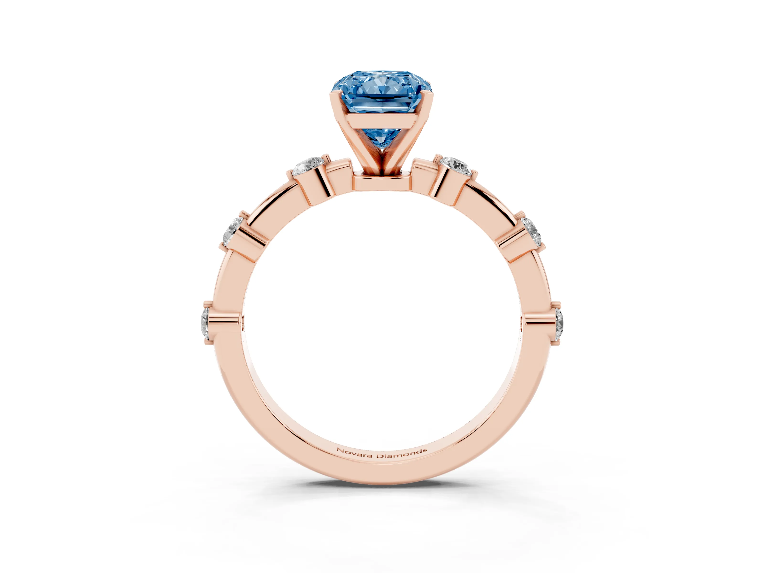 Fancy Blue Radiant Cut Diamond Solitaire Ring Set in Rose gold with Bezel Set Side Stones and Prong Setting