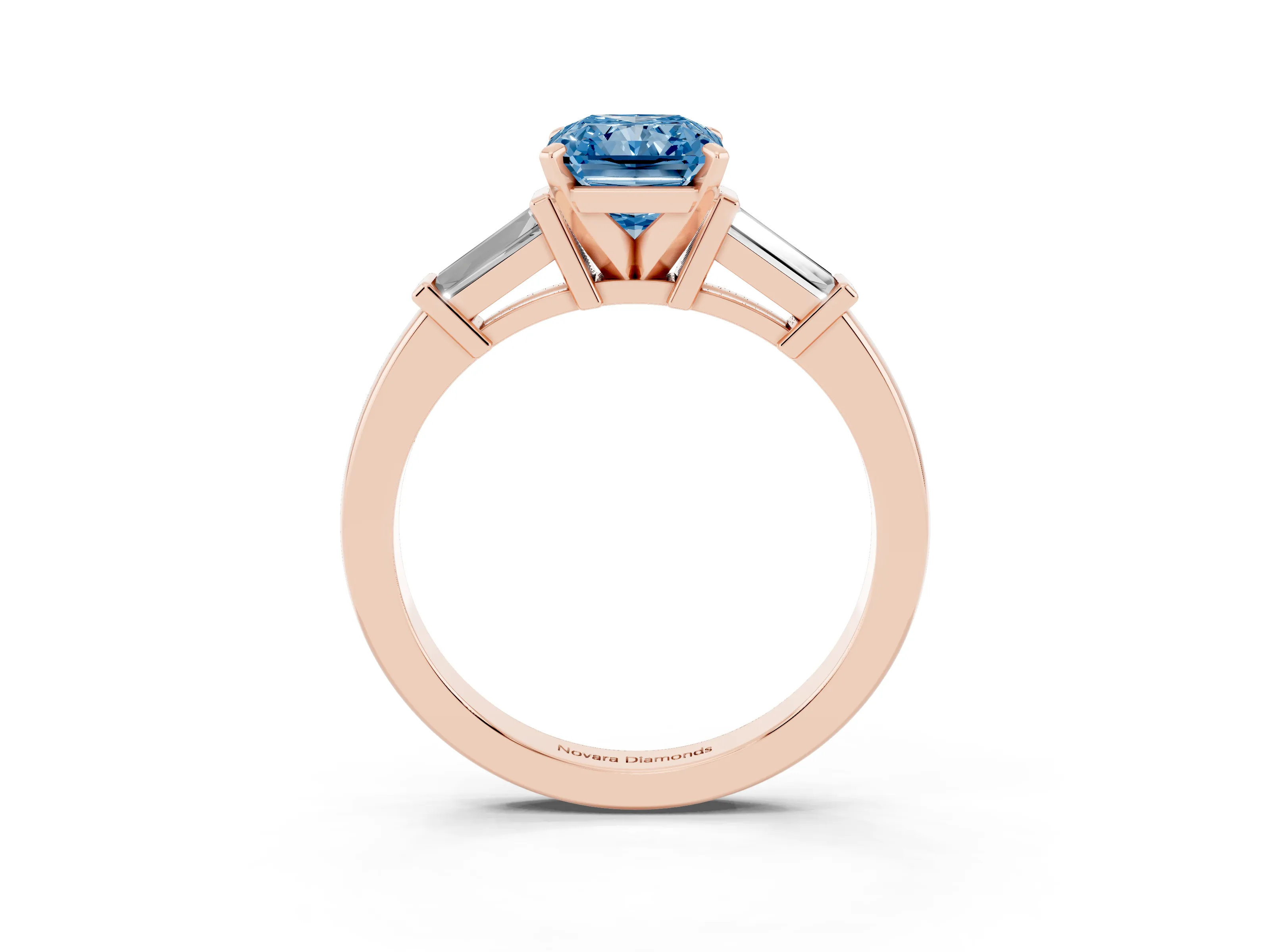 Fancy Blue Radiant Cut Diamond Solitaire Ring Set in Rose gold with Tapered Baguette Accents and Prong Setting