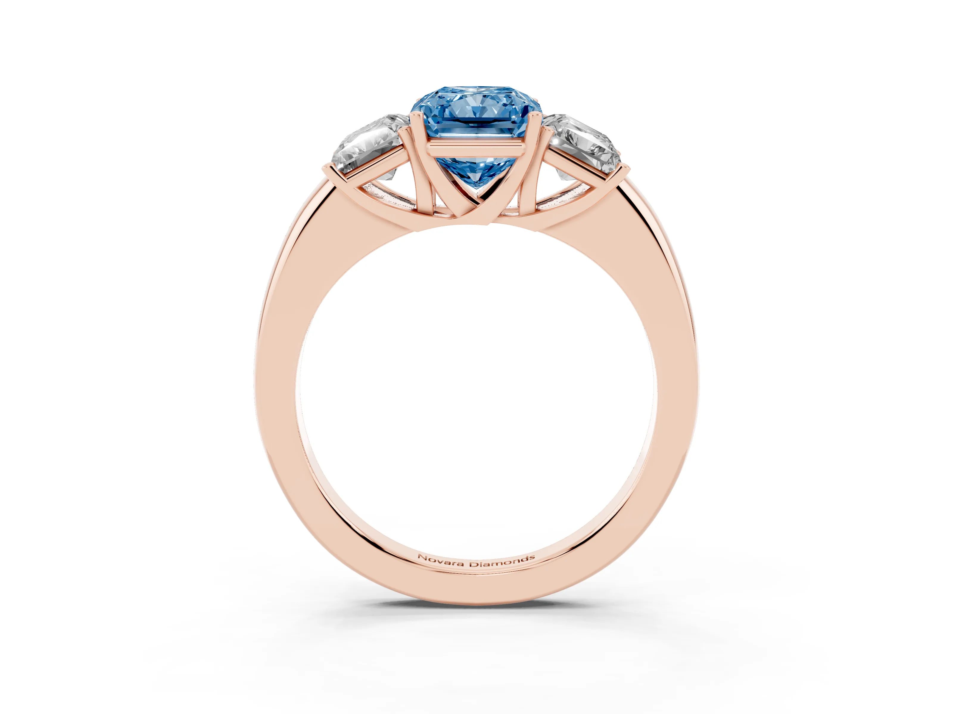 Fancy Blue Radiant Cut Diamond Three-Stone Ring Set in Rose gold with Bold Center and Classic Band