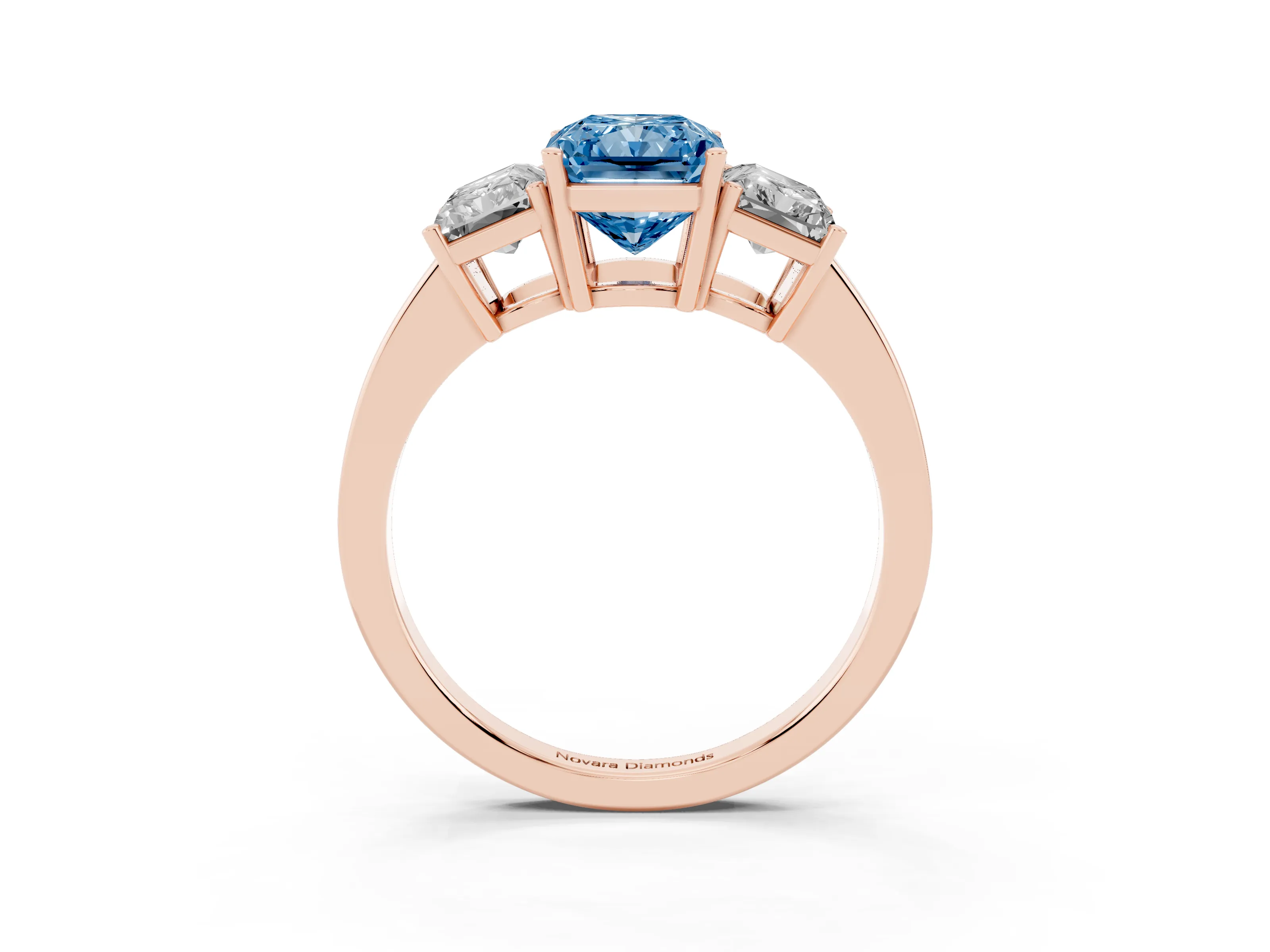 Fancy Blue Radiant Cut Diamond Three-Stone Engagement Ring Set in Rose gold with Flat Band