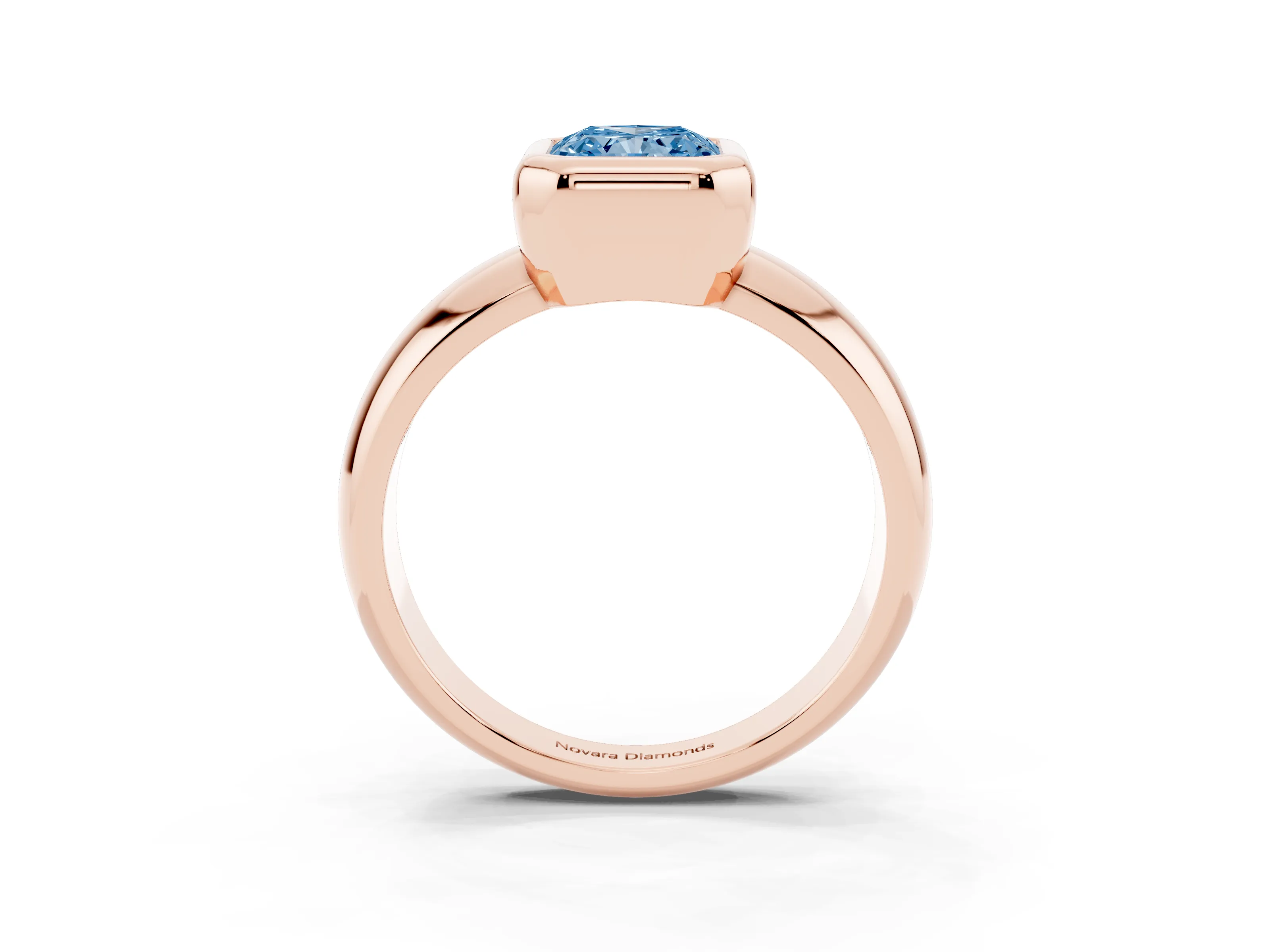 Fancy Blue Bezel Set Radiant Cut Diamond Solitaire Ring Set in Rose gold with Wide Band