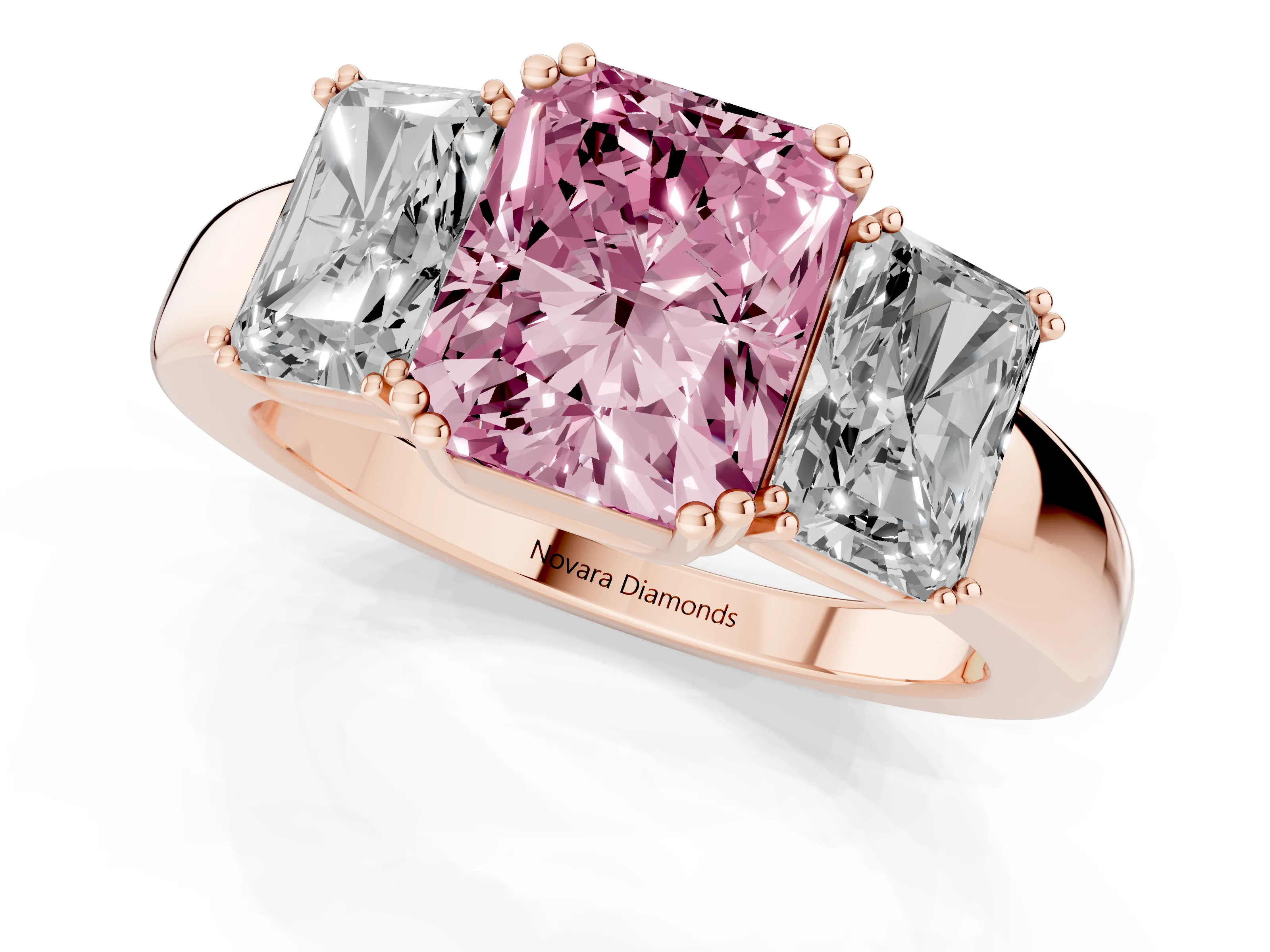 Fancy Pink Radiant Cut Diamond Three-Stone Ring Set in Rose gold with Polished Channel-Set Band
