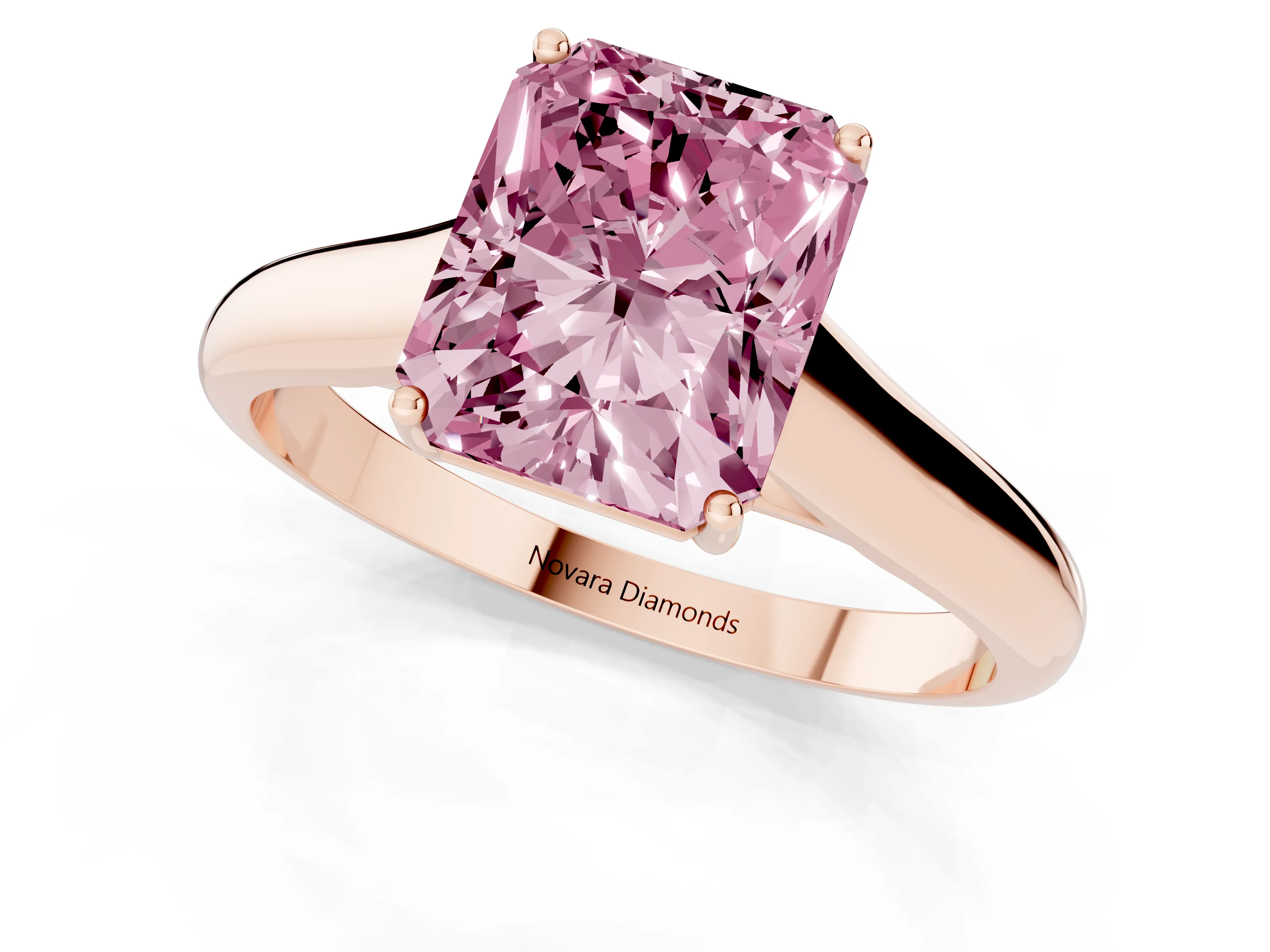 Fancy Pink Radiant Cut Diamond Solitaire Engagement Ring Set in Rose gold with Subtly Tapered Band and Prong Setting