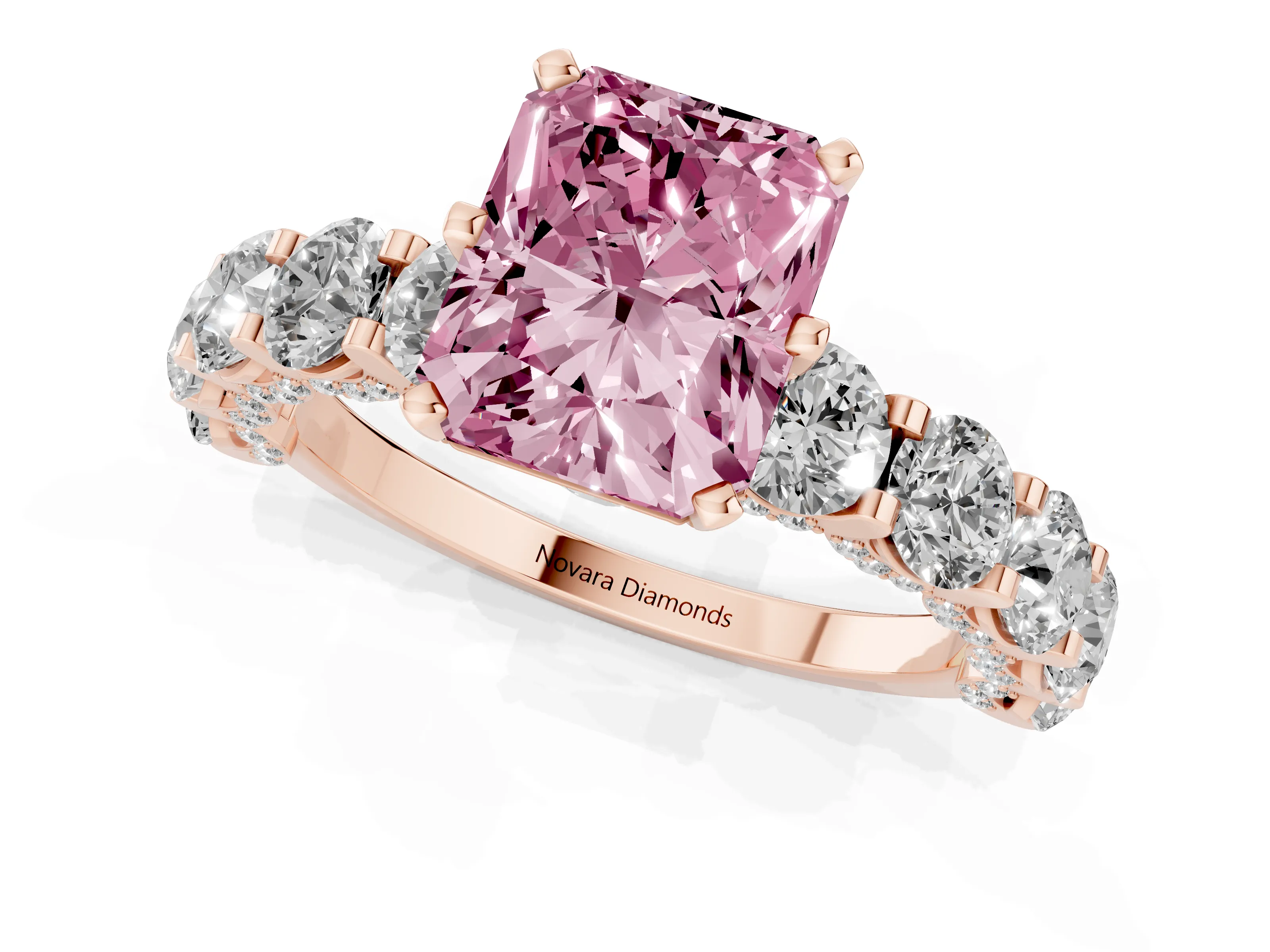 Fancy Pink Radiant Cut Diamond Side Stone Ring Set in Rose gold with Alternating Round and Oval Side Stones