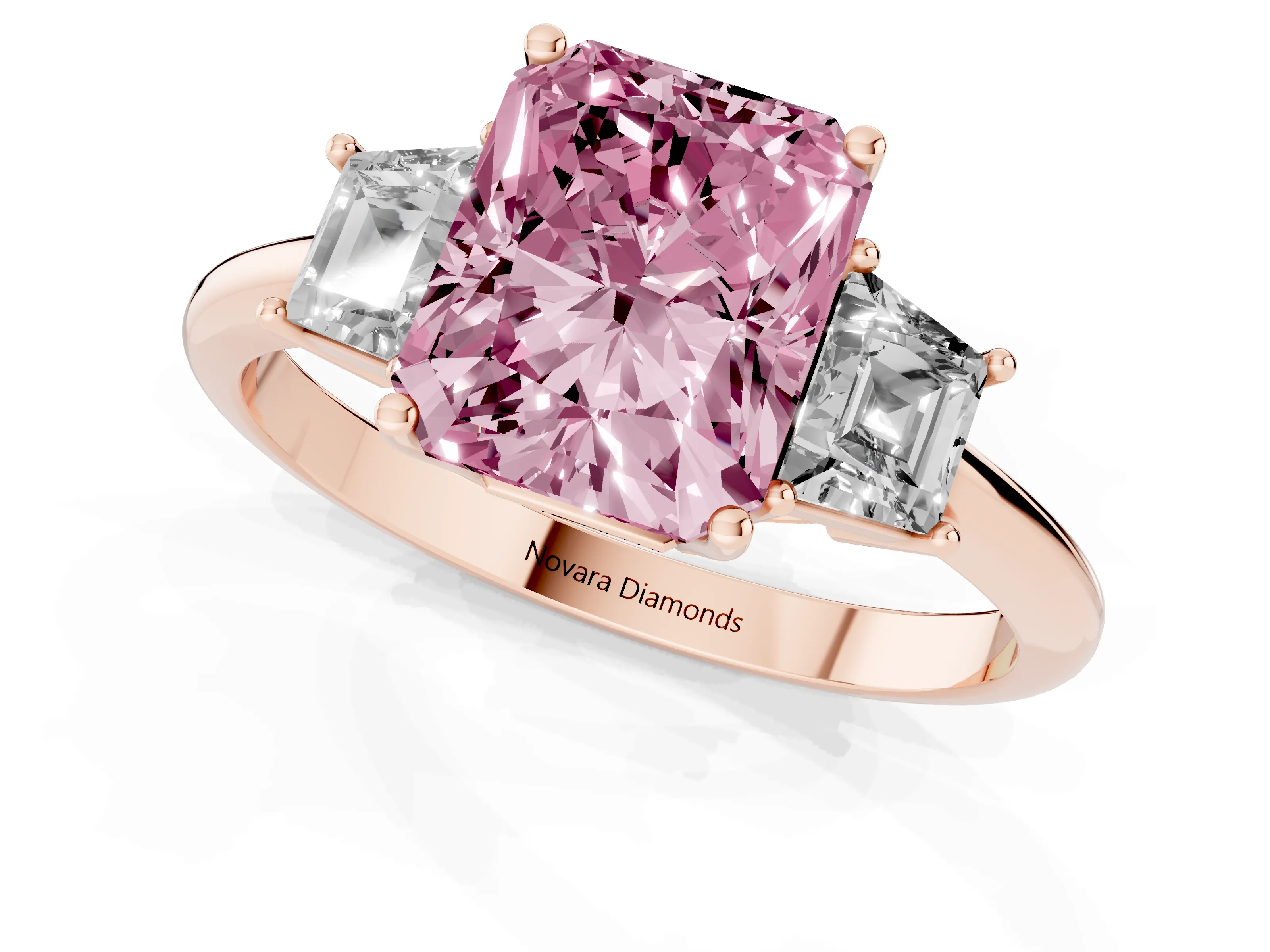 Fancy Pink Radiant Cut Diamond Three-Stone Ring Set in Rose gold with Trapezoid Side Stones and Prong Setting