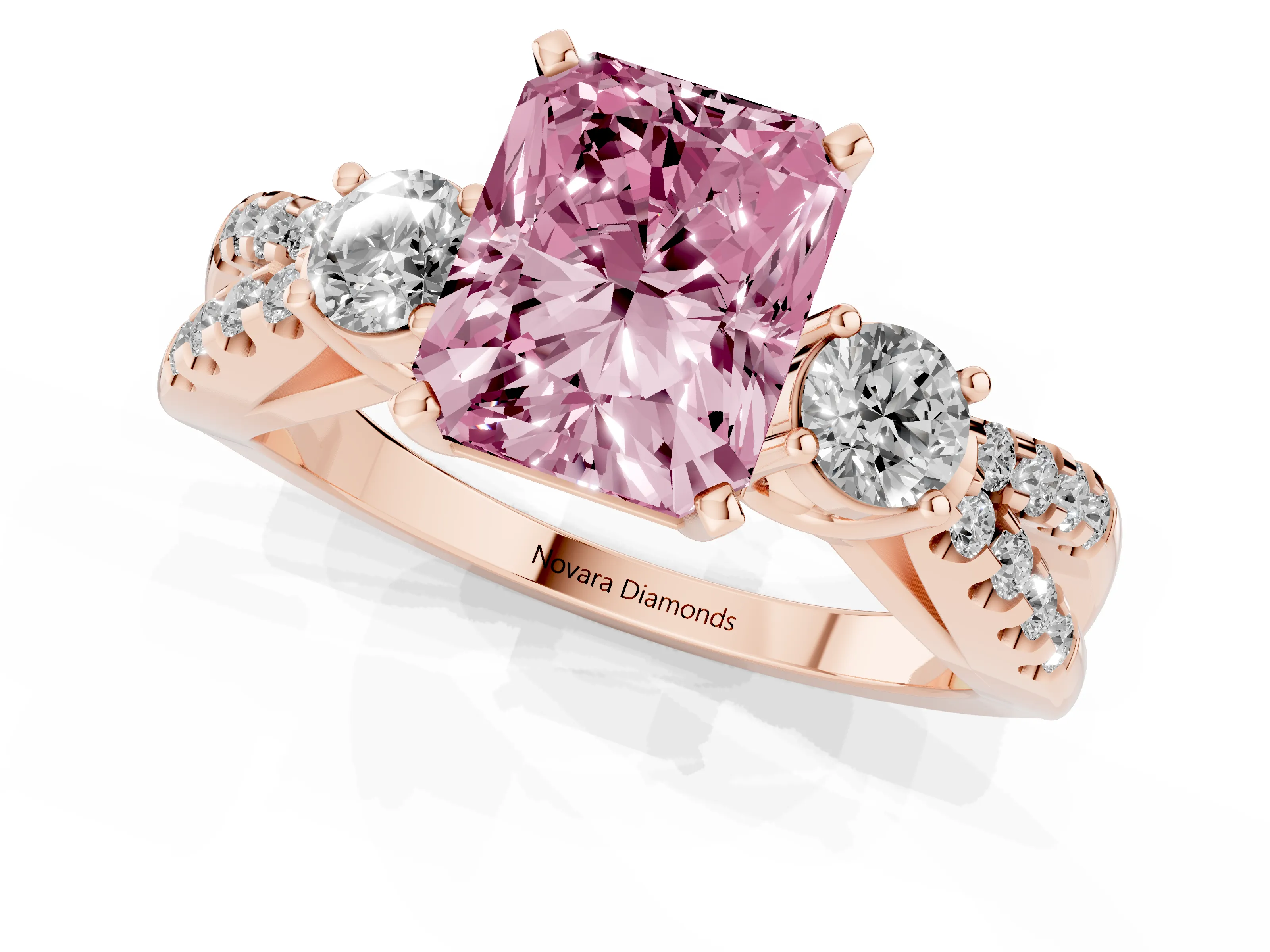 Fancy Pink Radiant Cut Diamond Three-Stone Ring Set in Rose gold with Pavé Split Shank and Prong Setting