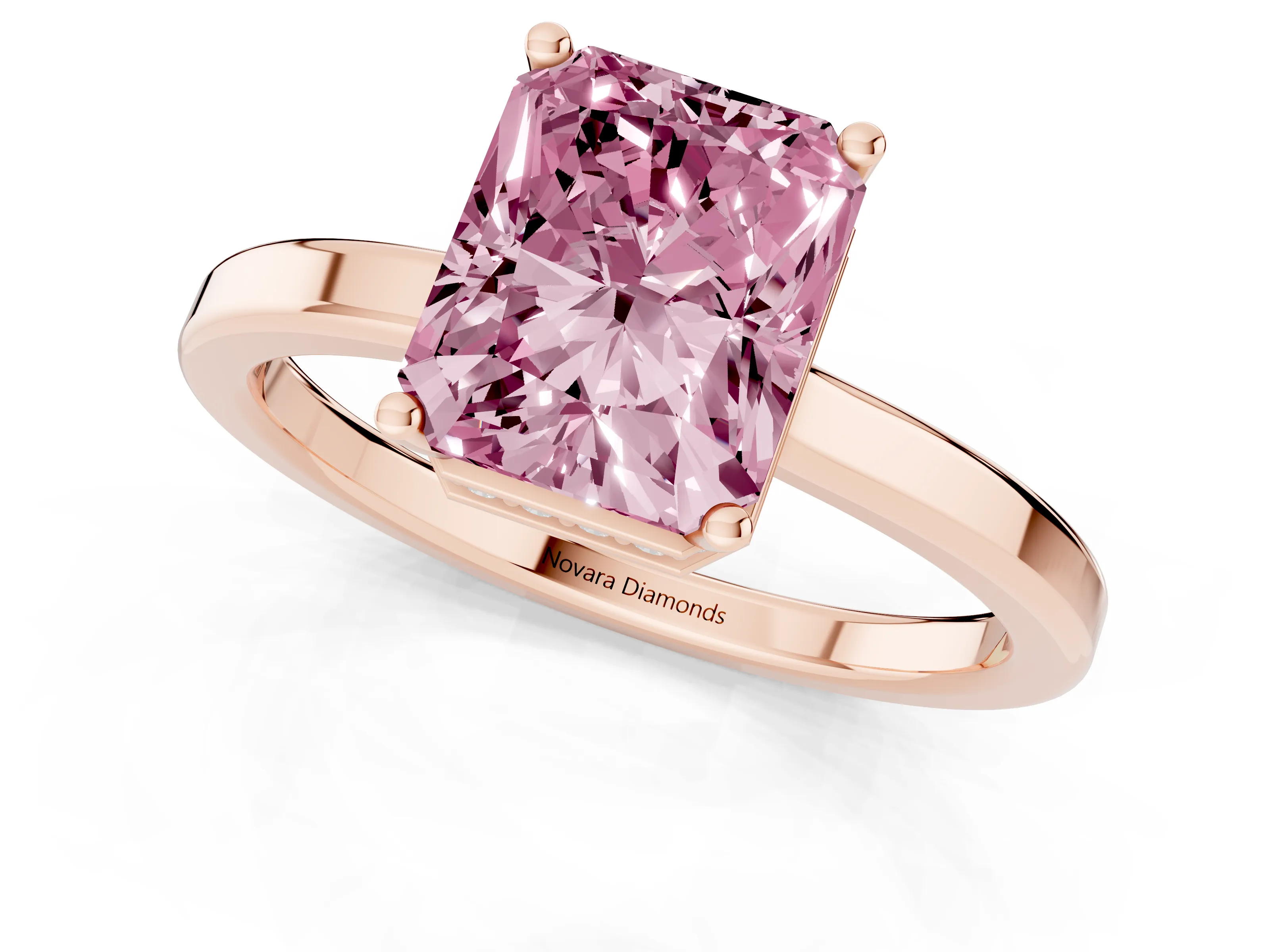 Fancy Pink Radiant Cut Diamond Solitaire Engagement Ring Set in Rose gold with Prong Setting on a Plain Band