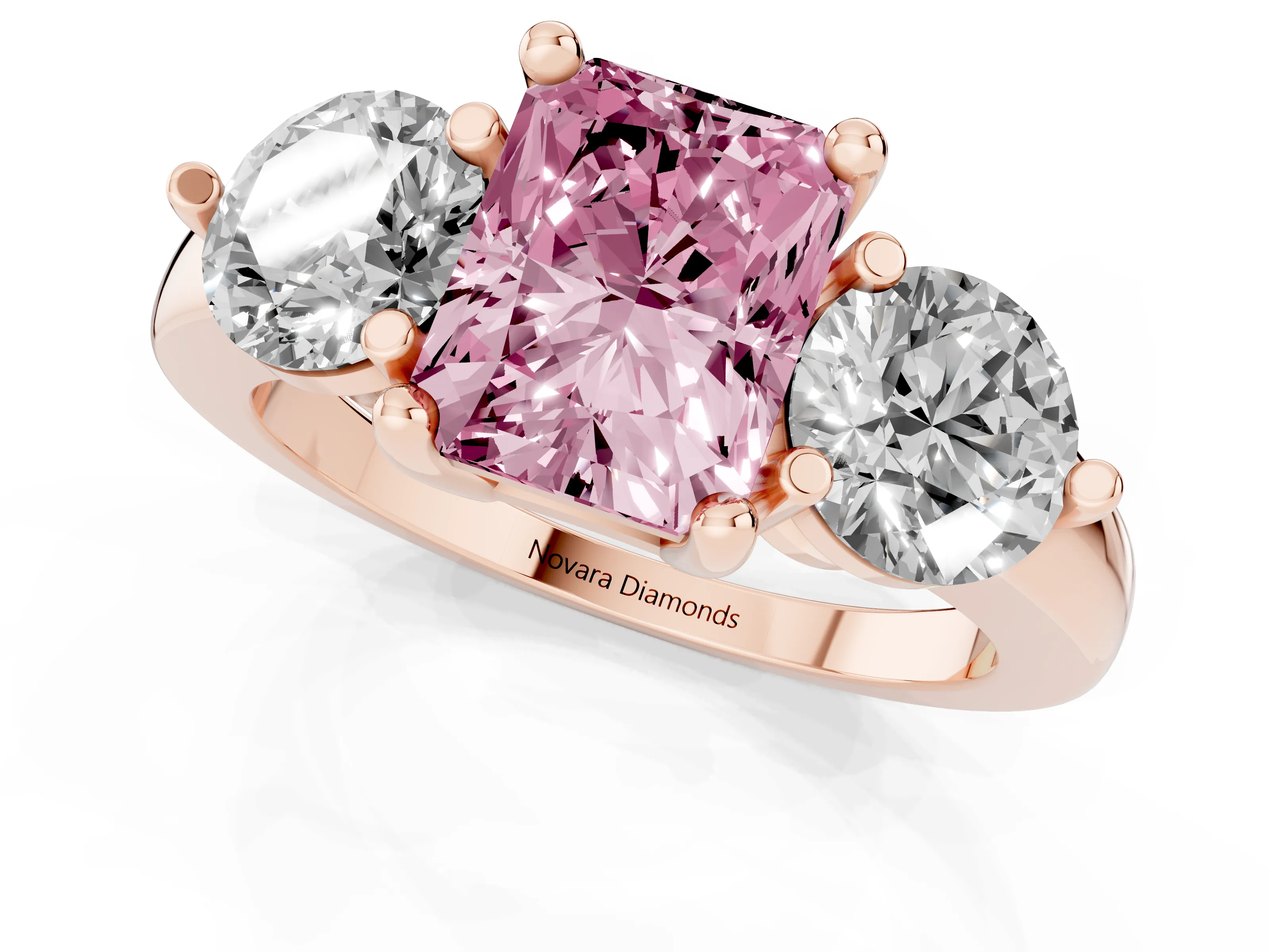 Fancy Pink Radiant Cut Diamond Three-Stone Ring Set in Rose gold with Prong Setting and Classic Band