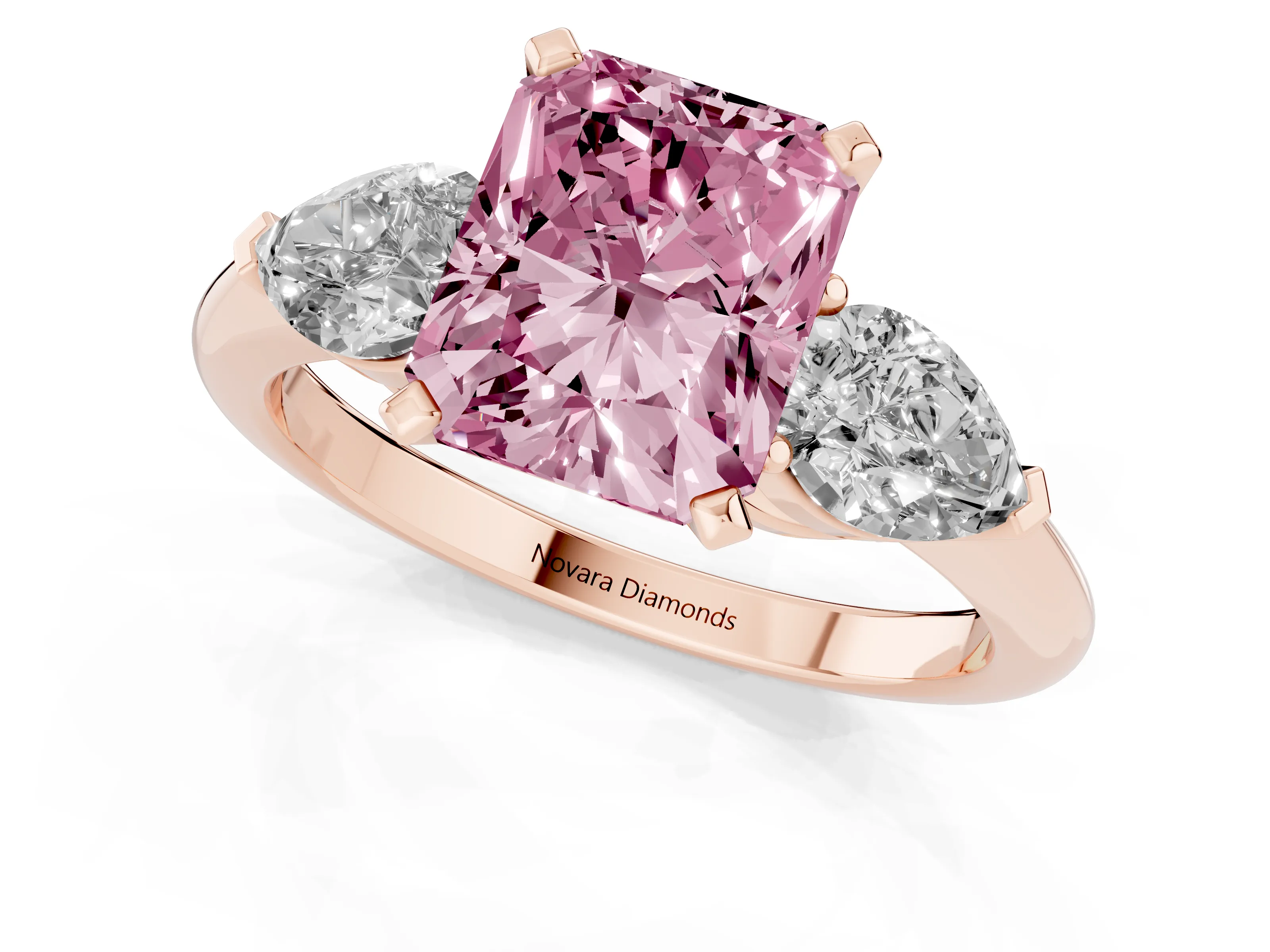 Fancy Pink Three-Stone Radiant Cut Diamond Ring Set in Rose gold with Pear Side Stones and Prong Setting
