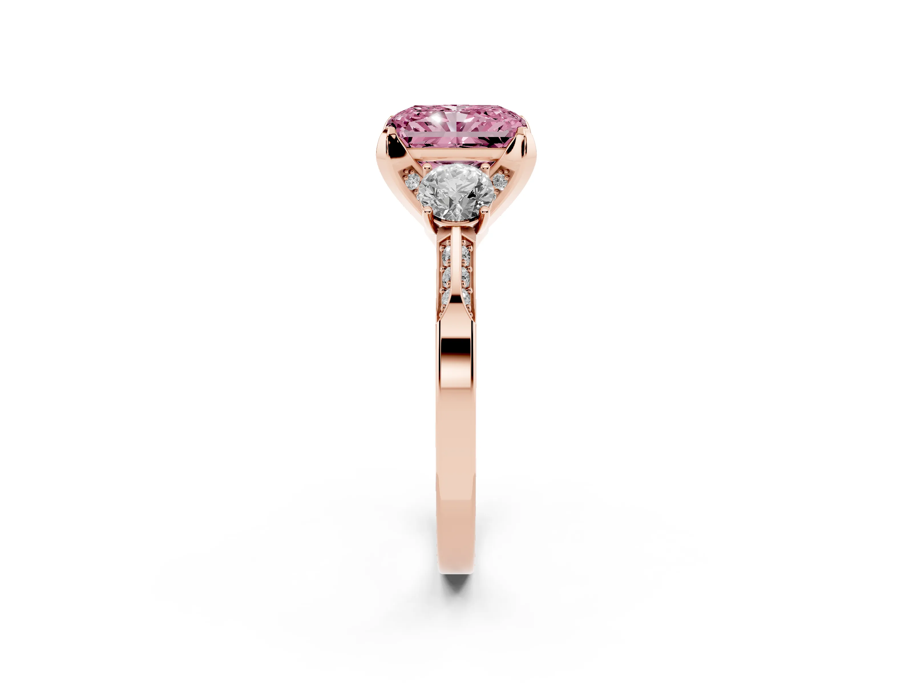 Fancy Pink Radiant Cut Diamond Three-Stone Ring Set in Rose gold with Pavé Band and Smaller Side Stones
