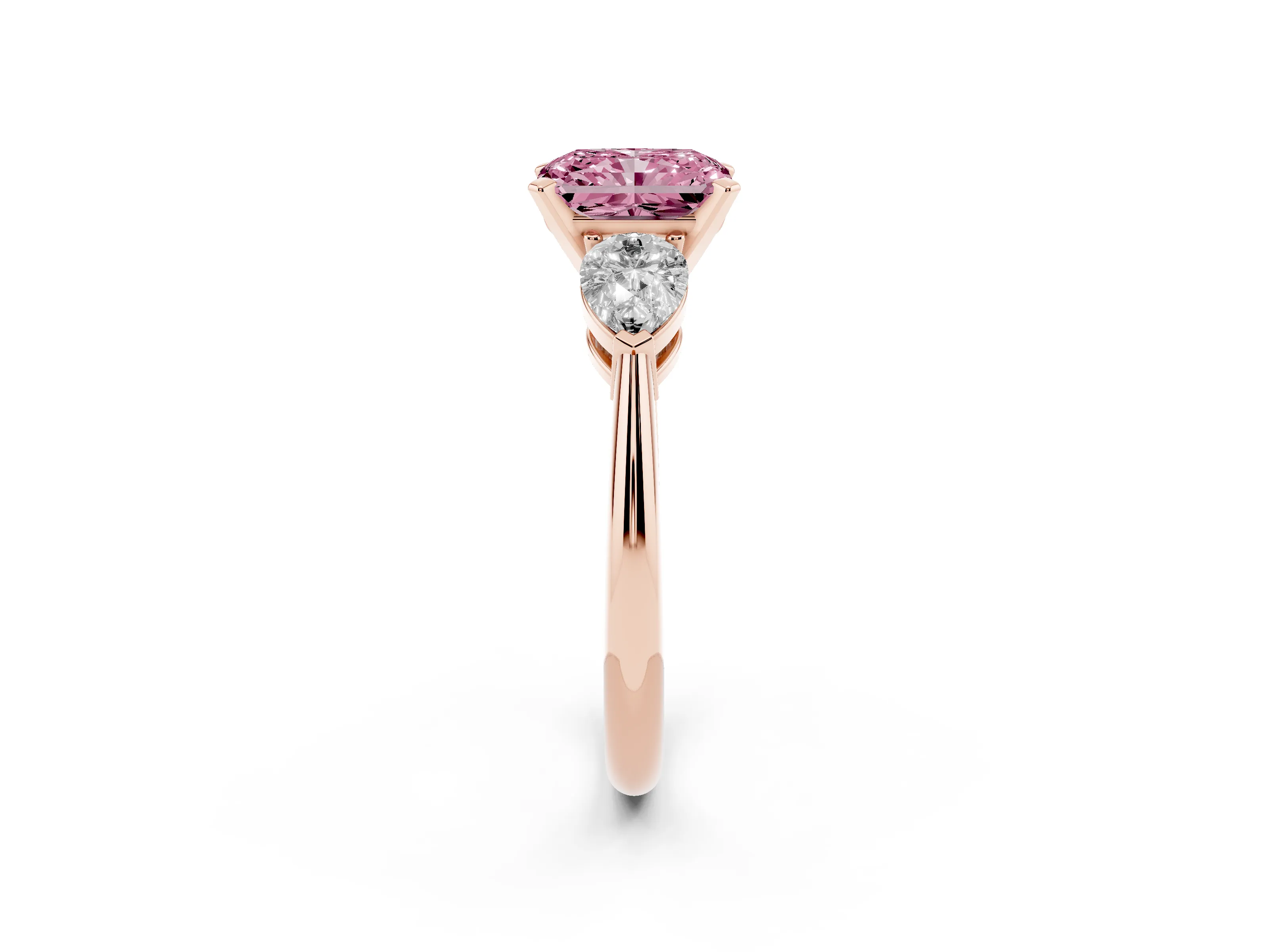 Fancy Pink Three-Stone Radiant Cut Diamond Ring Set in Rose gold with Pear Side Stones and Prong Setting