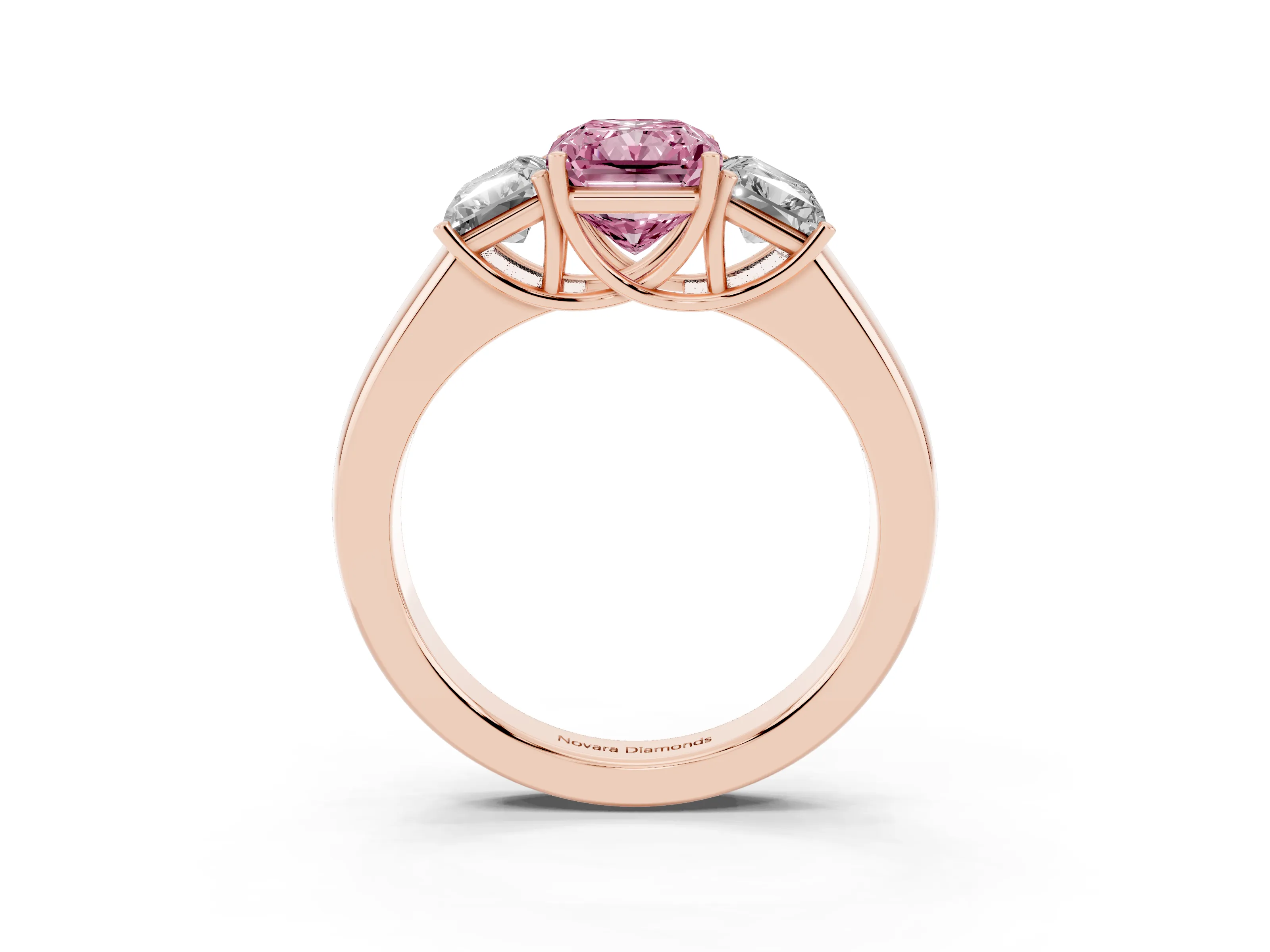 Fancy Pink Three-Stone Radiant Cut Diamond Ring Set in Rose gold with Matching Prong Settings and Plain Band