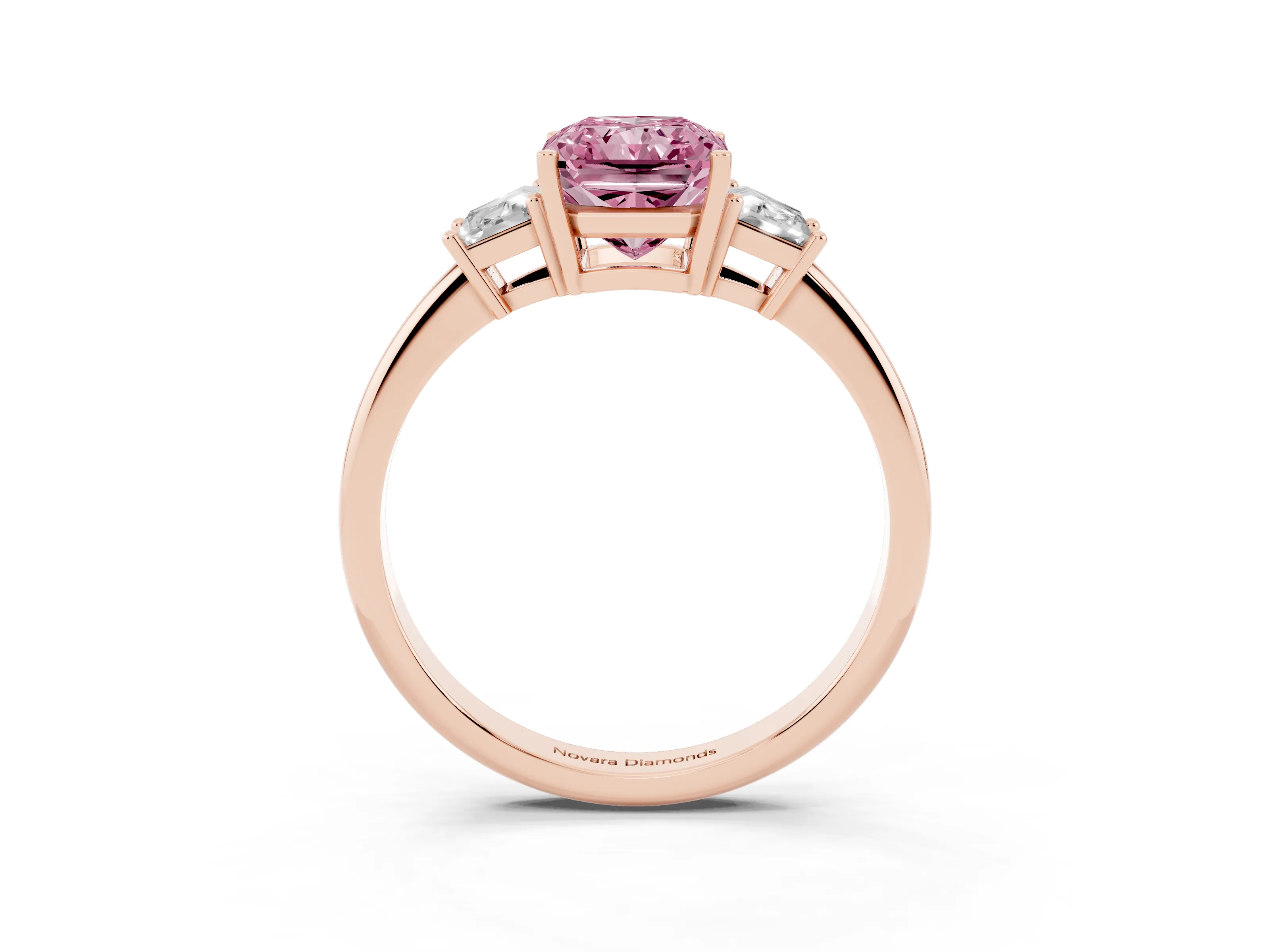 Fancy Pink Radiant Cut Diamond Three-Stone Ring Set in Rose gold with Trapezoid Side Stones and Prong Setting