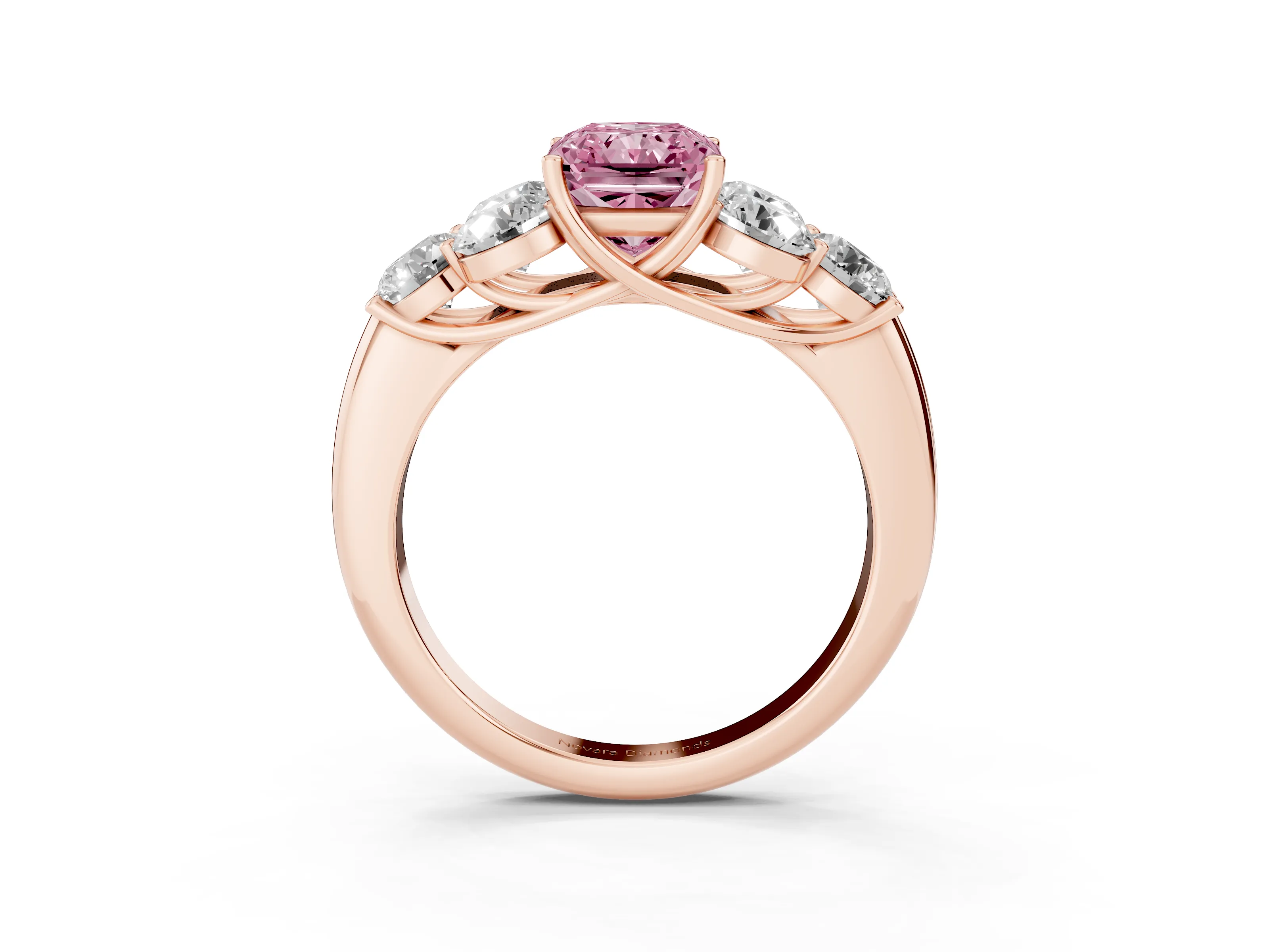 Fancy Pink Radiant Cut Diamond Cluster Ring Set in Rose gold with Round Accent Stones and Prong Setting on a Plain Band