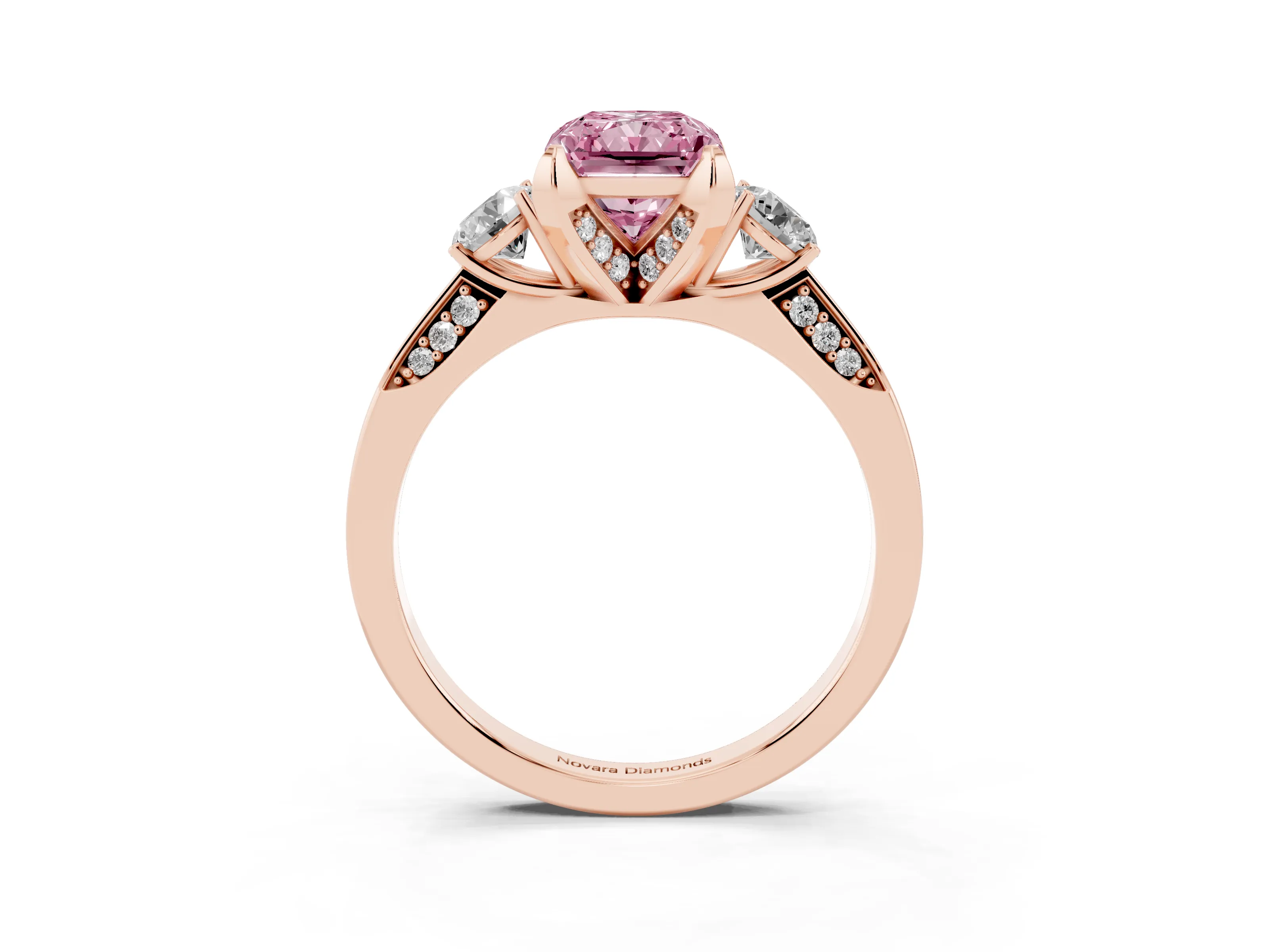 Fancy Pink Radiant Cut Diamond Three-Stone Ring Set in Rose gold with Pavé Band and Smaller Side Stones