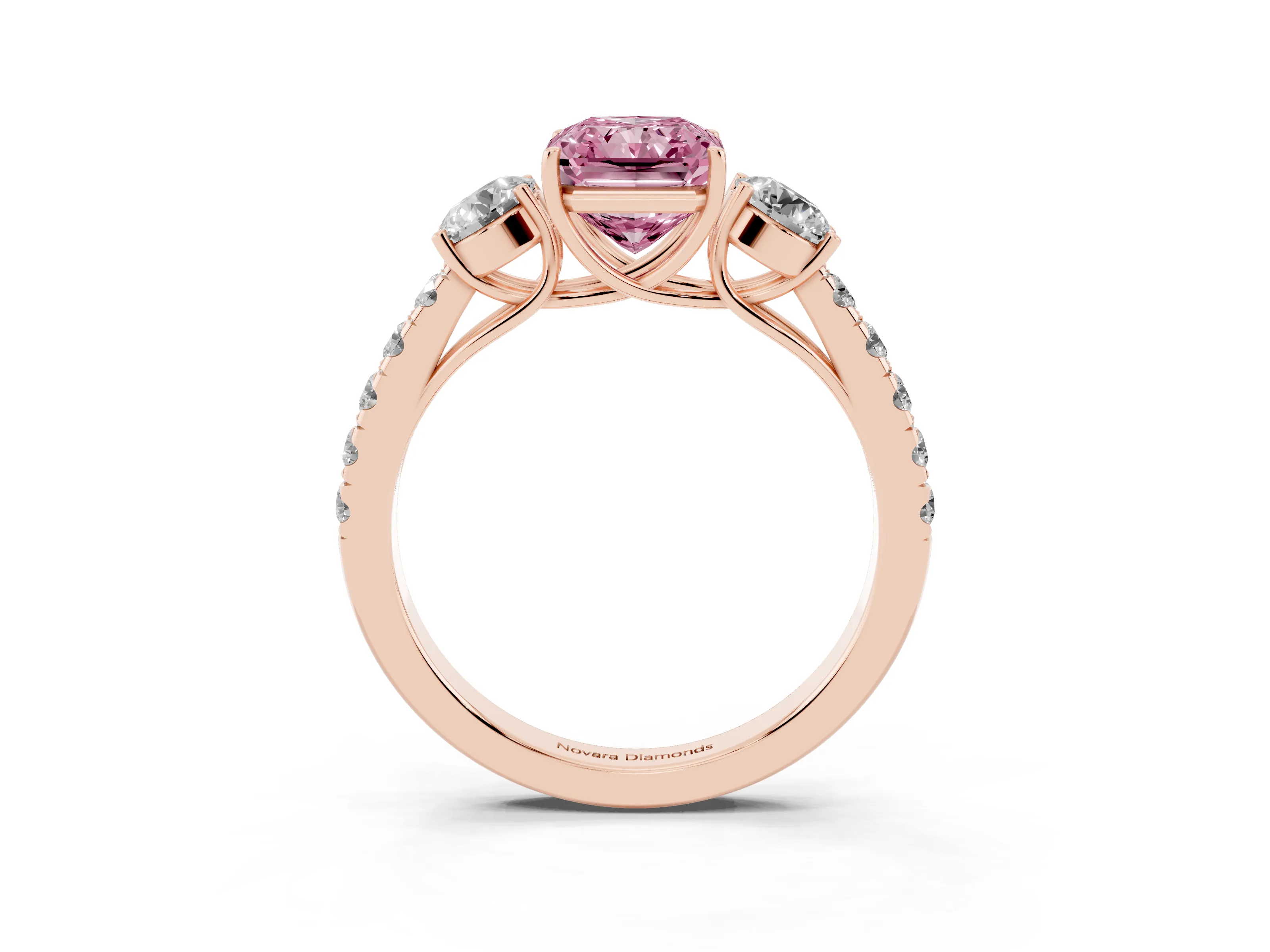Fancy Pink Radiant Cut Diamond Three-Stone Ring Set in Rose gold with Round Side Stones and Delicate Pavé Band