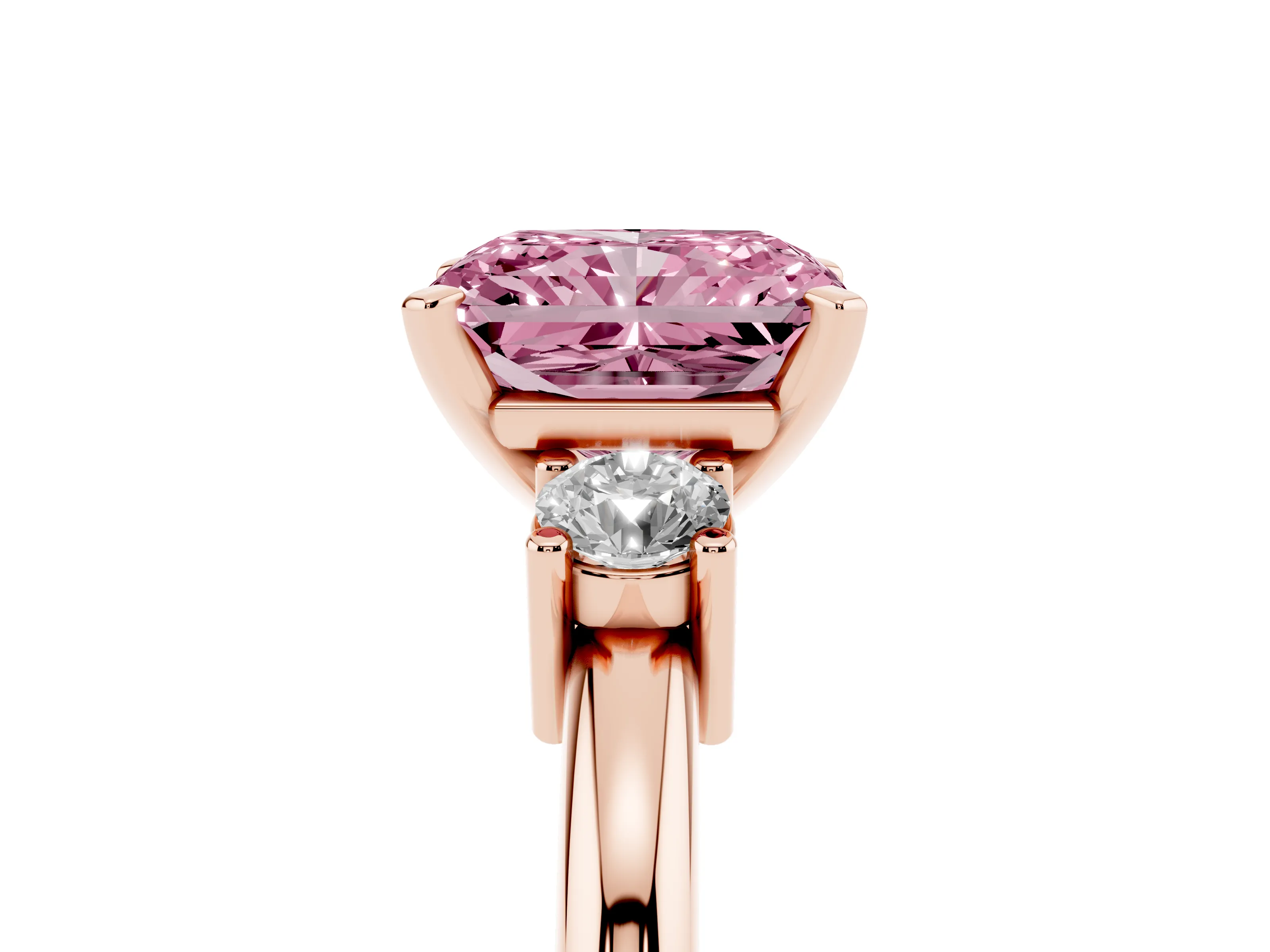 Fancy Pink Three-Stone Radiant Cut Diamond Ring Set in Rose gold with Prong Setting and Plain Band