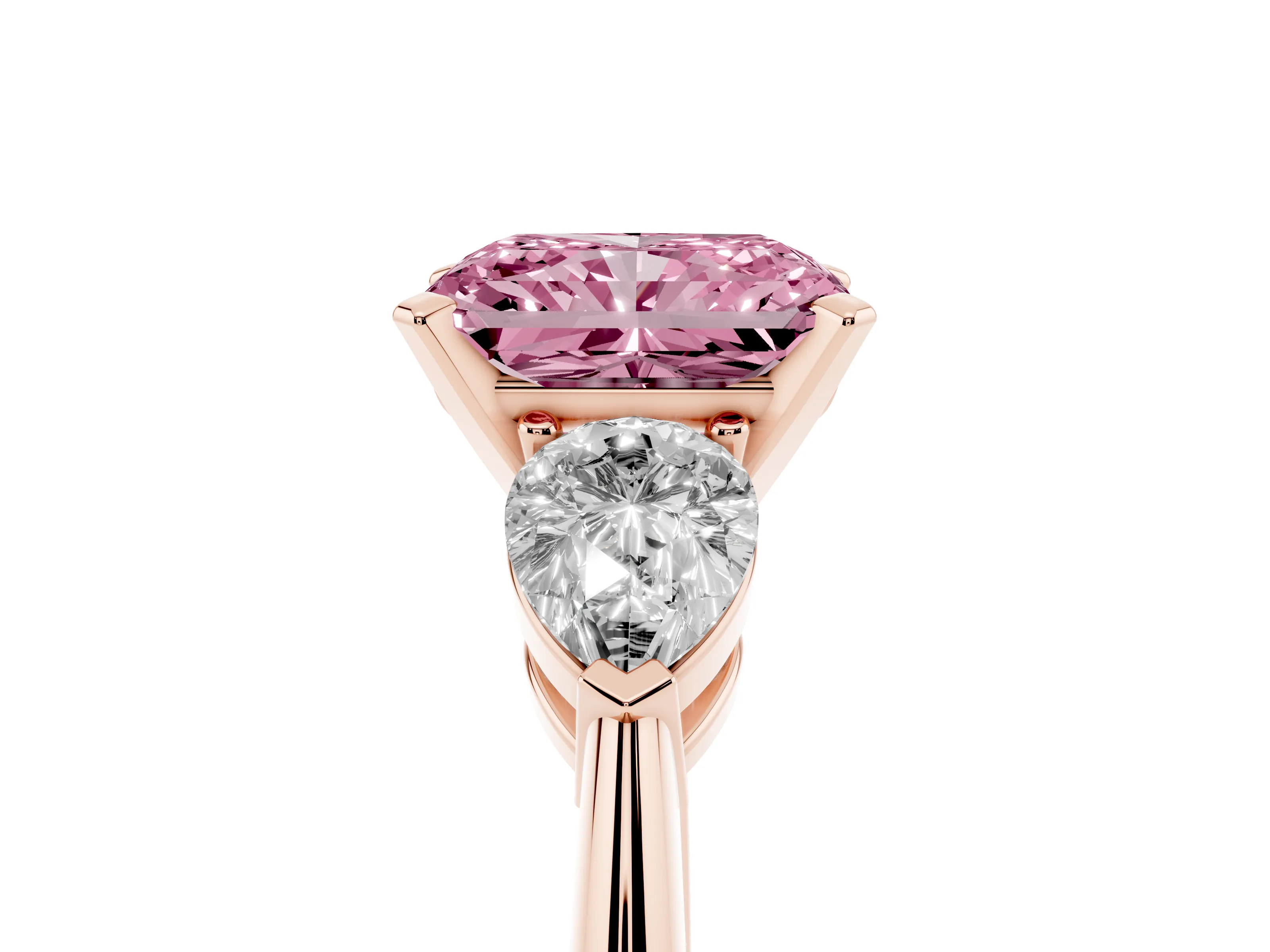 Fancy Pink Three-Stone Radiant Cut Diamond Ring Set in Rose gold with Pear Side Stones and Prong Setting