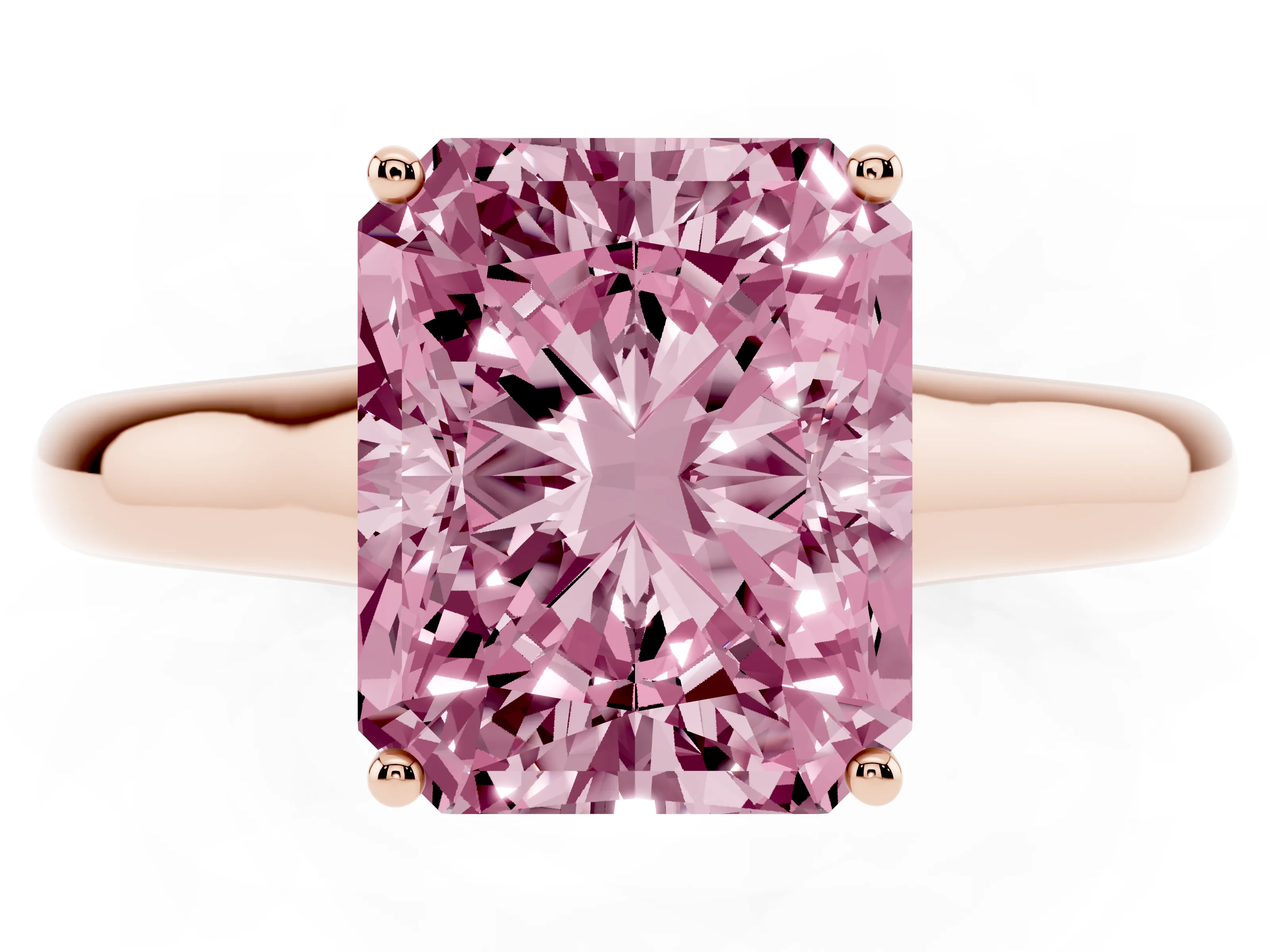 Fancy Pink Radiant Cut Diamond Solitaire Engagement Ring Set in Rose gold with Subtly Tapered Band and Prong Setting