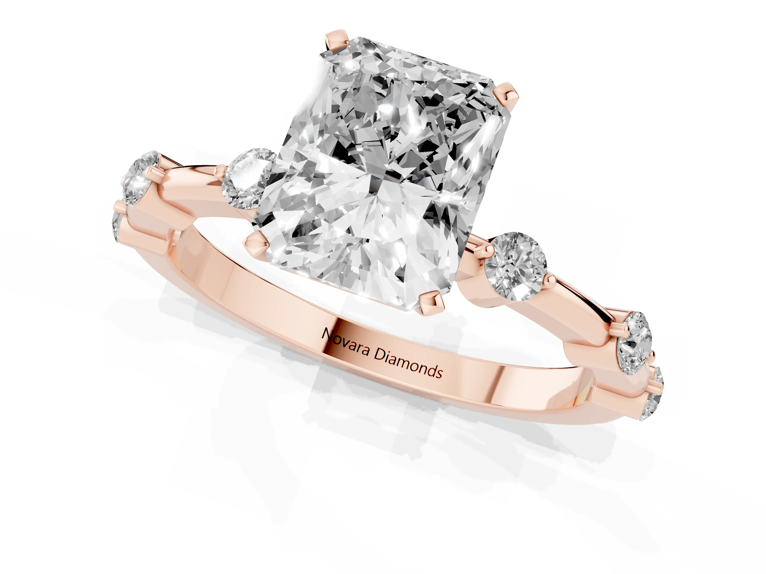Radiant Cut Diamond Solitaire Ring Set in Rose gold with Bezel Set Side Stones and Prong Setting
