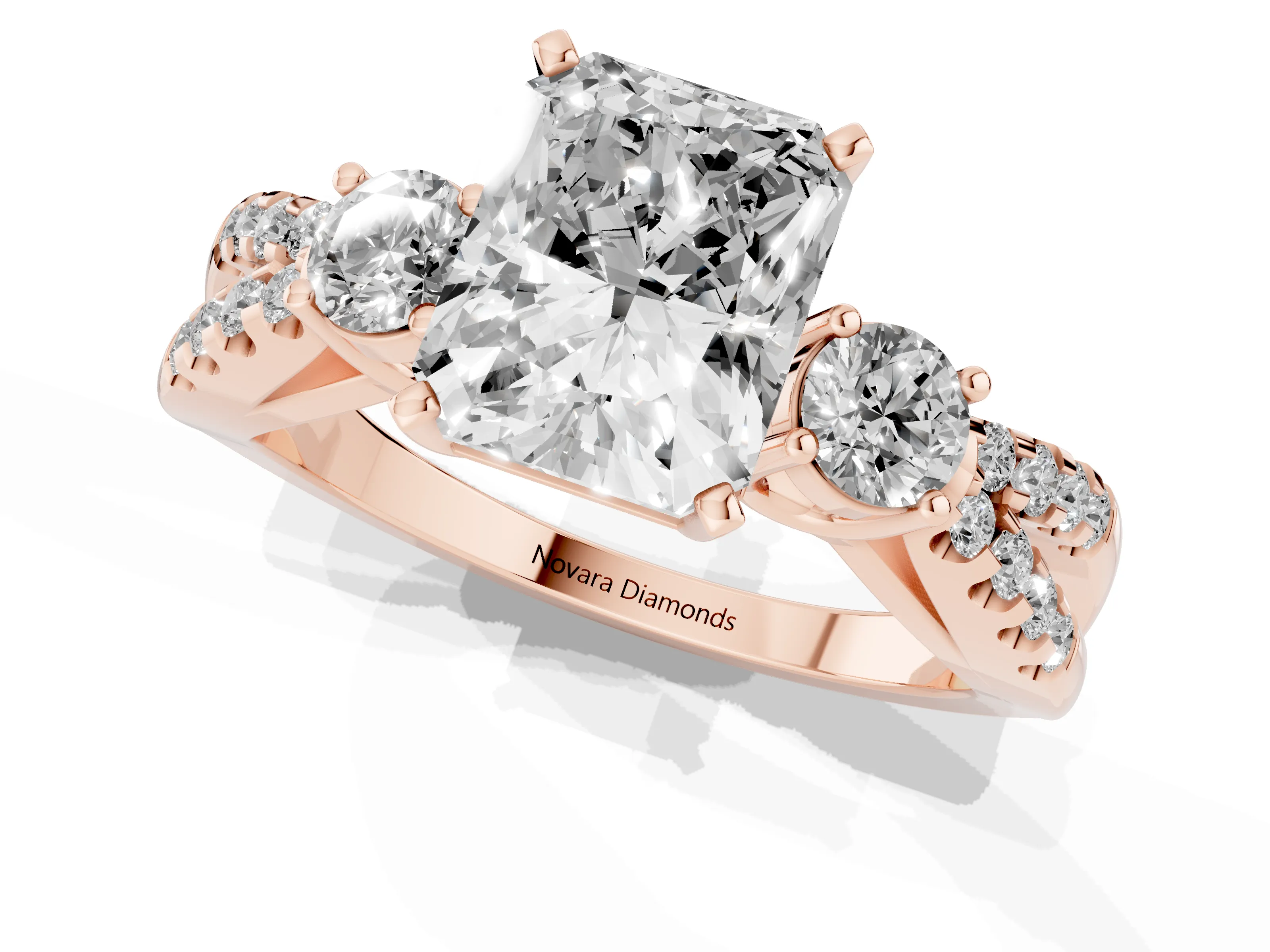 Radiant Cut Diamond Three-Stone Ring Set in Rose gold with Pavé Split Shank and Prong Setting