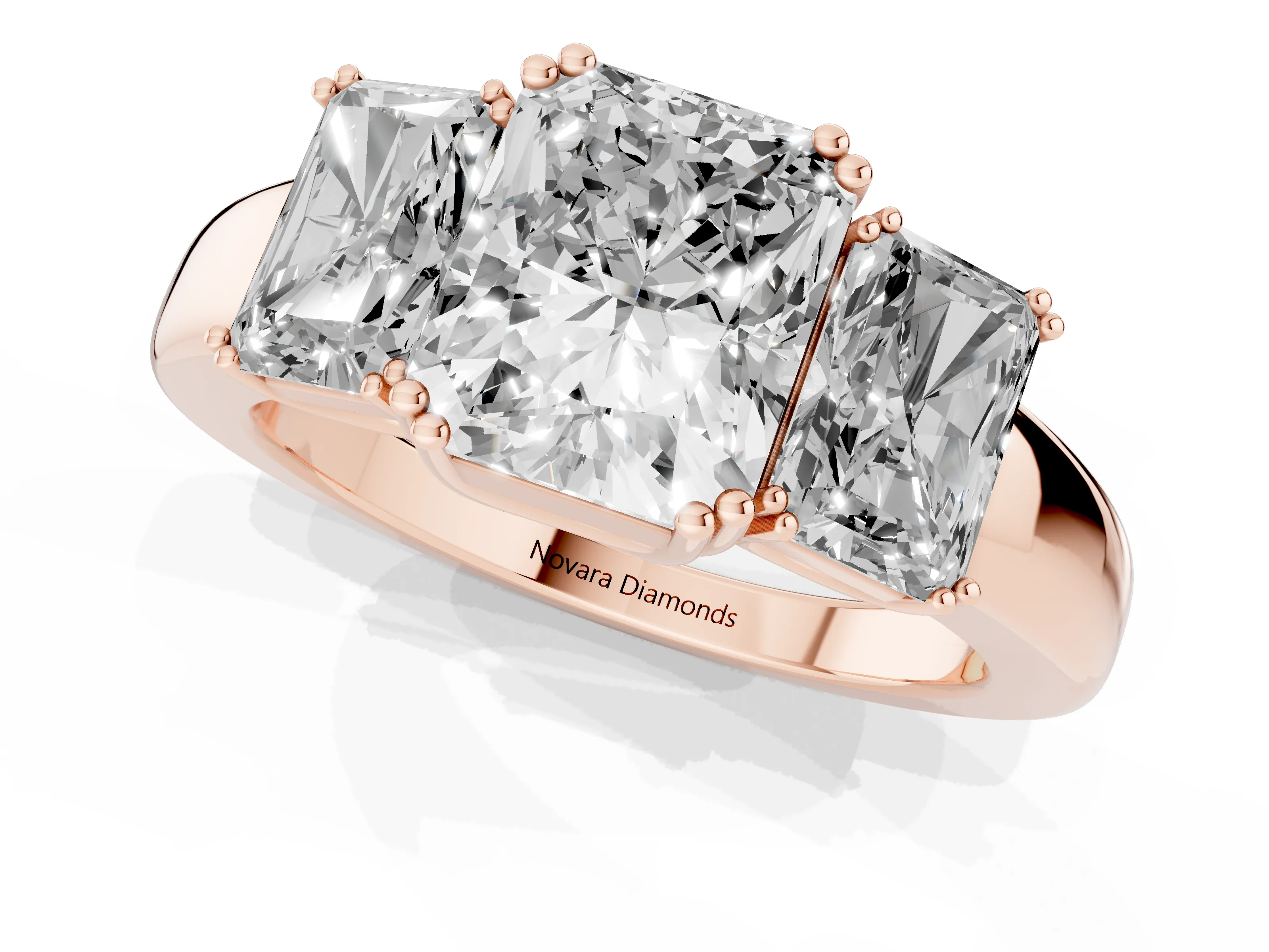 Radiant Cut Diamond Three-Stone Ring Set in Rose gold with Polished Channel-Set Band
