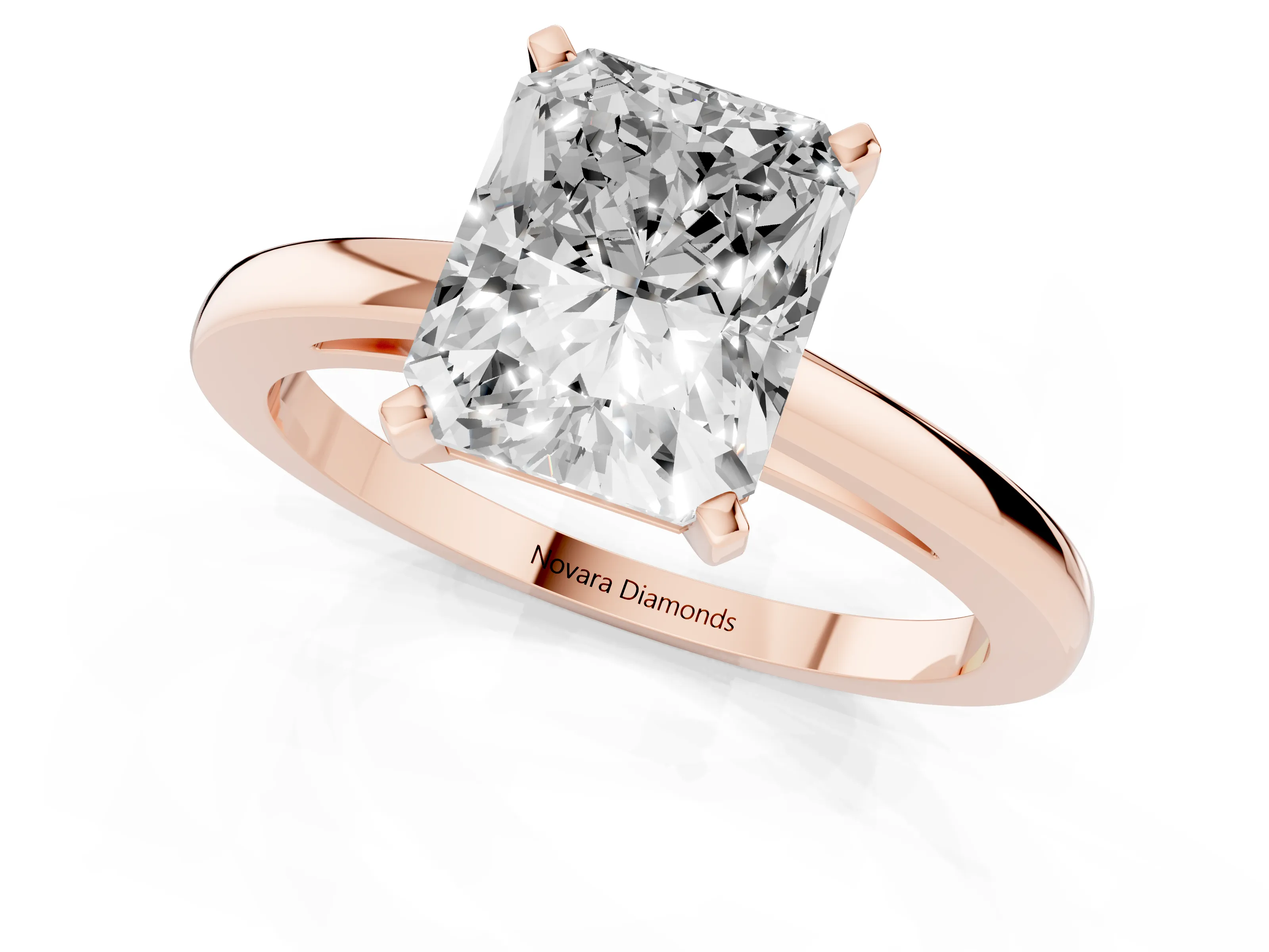 Radiant Cut Diamond Solitaire Engagement Ring Set in Rose gold with Prong Setting on a Classic Band