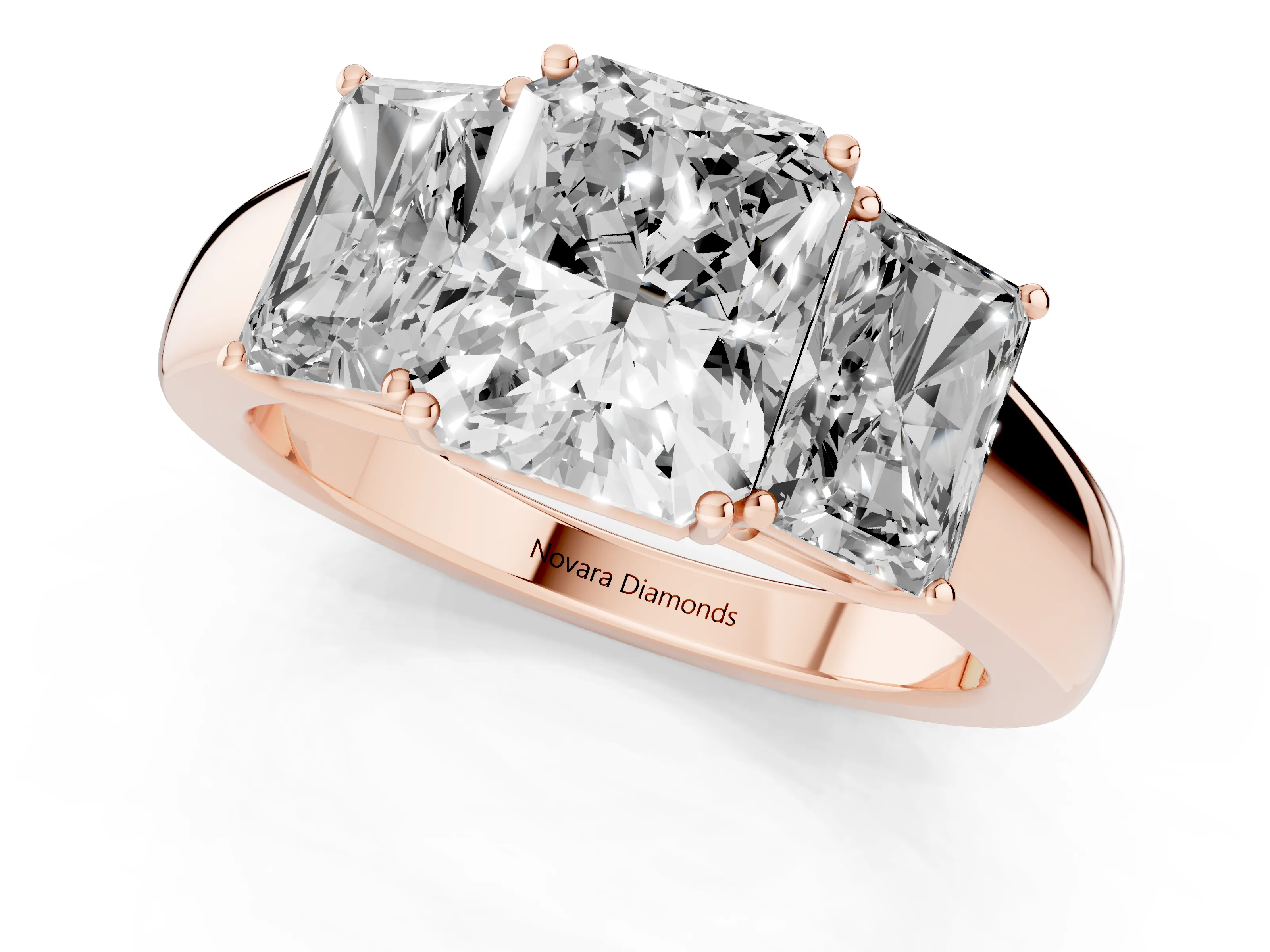 Three-Stone Radiant Cut Diamond Ring Set in Rose gold with Matching Prong Settings and Plain Band