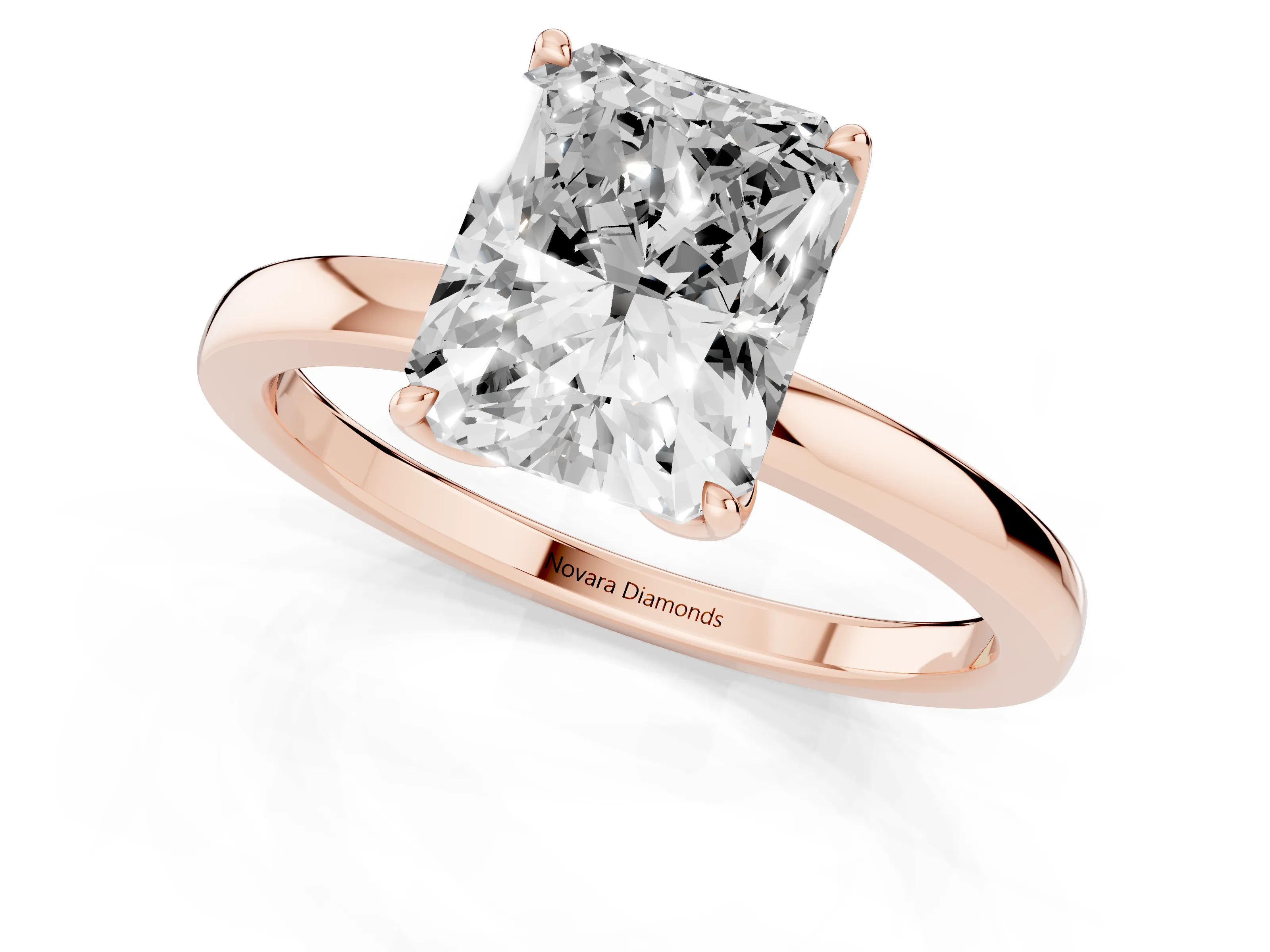 Radiant Cut Diamond Solitaire Ring Set in Rose gold with Prong Setting and Thin Polished Band