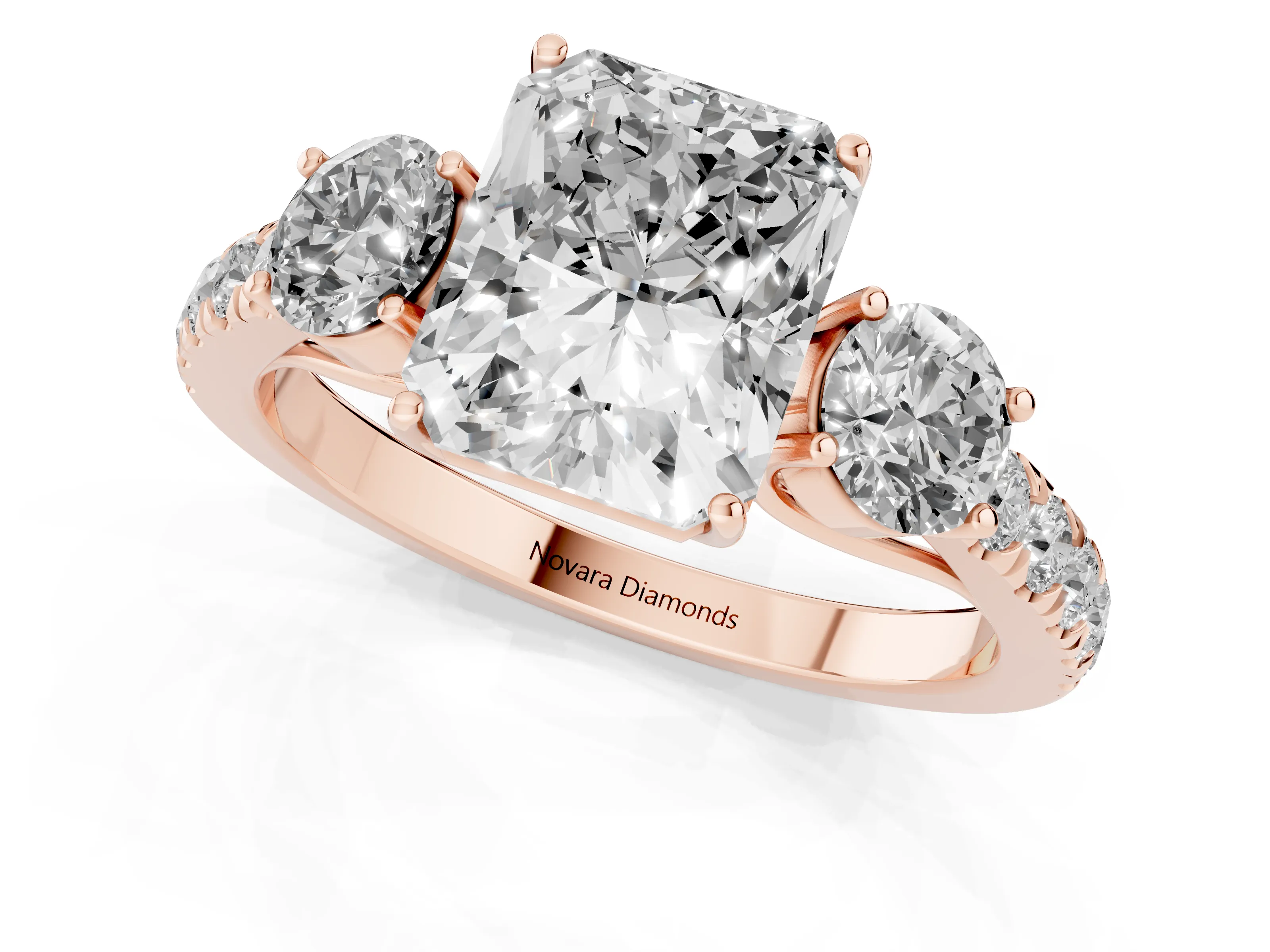 Radiant Cut Diamond Three-Stone Ring Set in Rose gold with Round Side Stones and Delicate Pavé Band