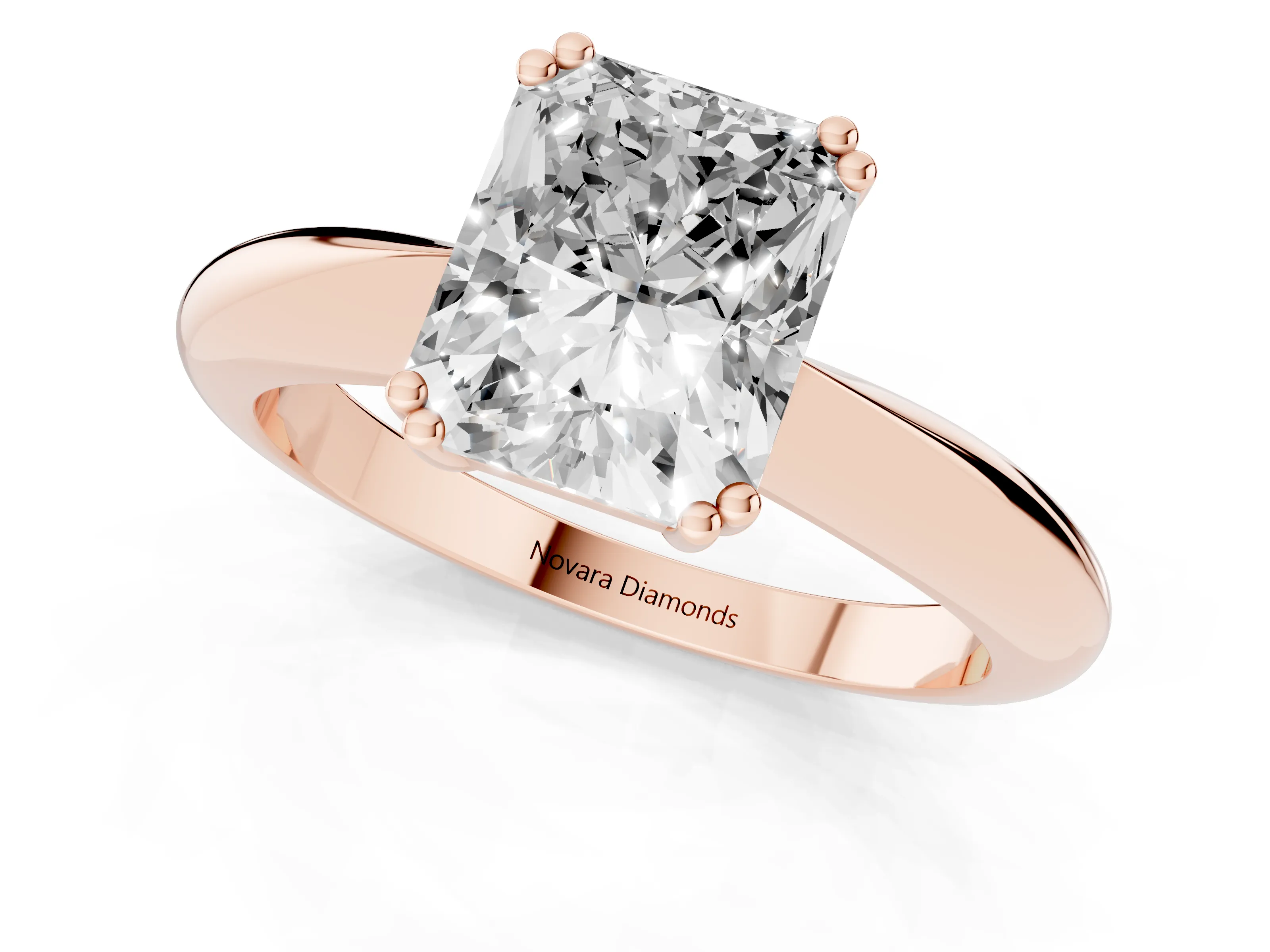 Radiant Cut Diamond Solitaire Engagement Ring Set in Rose gold with Tapered Band and Prong Setting