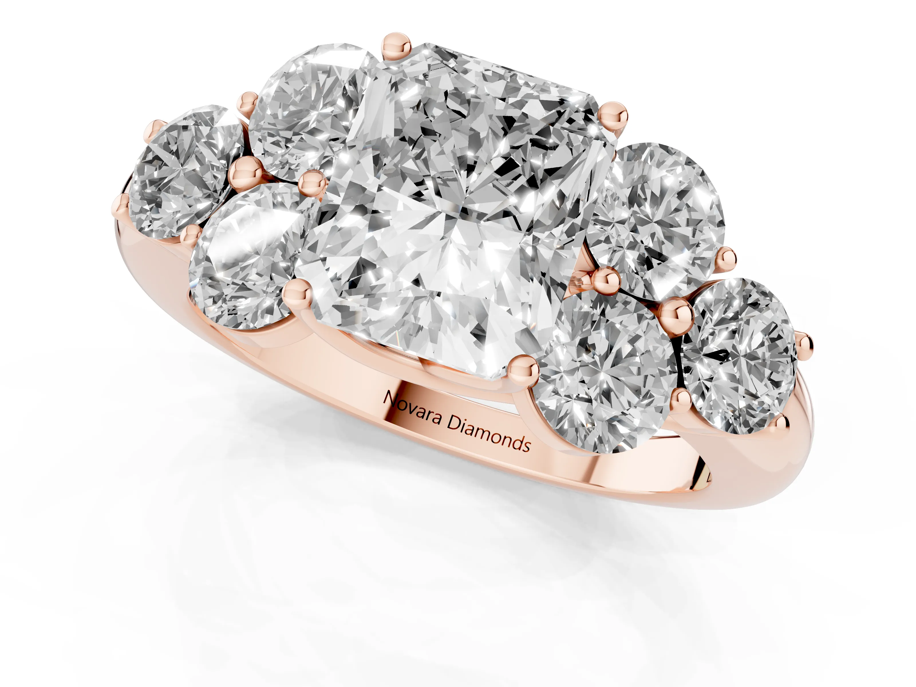 Radiant Cut Diamond Cluster Ring Set in Rose gold with Round Accent Stones and Prong Setting on a Plain Band