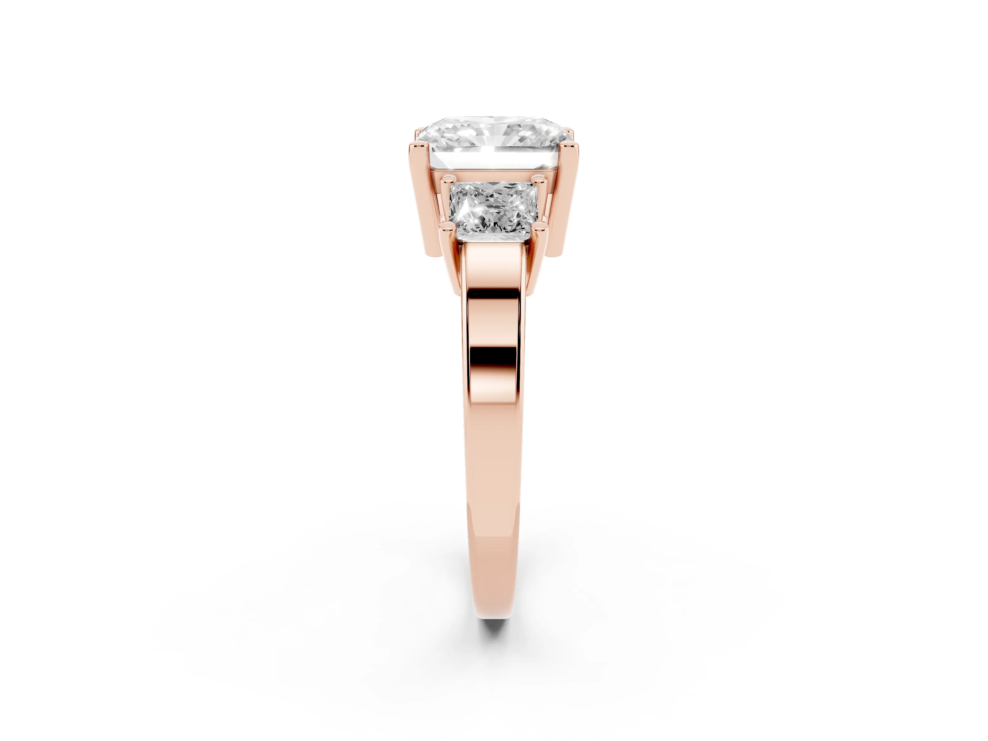 Three-Stone Radiant Cut Diamond Solitaire Ring Set in Rose gold with Prong Setting