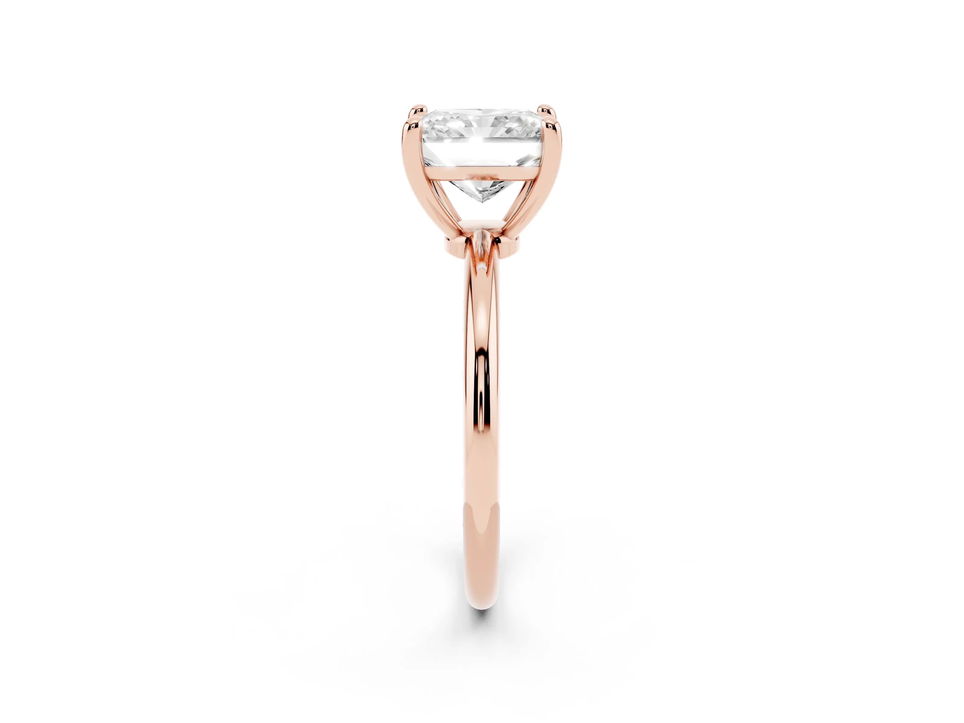 Radiant Cut Diamond Solitaire Ring Set in Rose gold with Secure Prong Setting on a Classic Band
