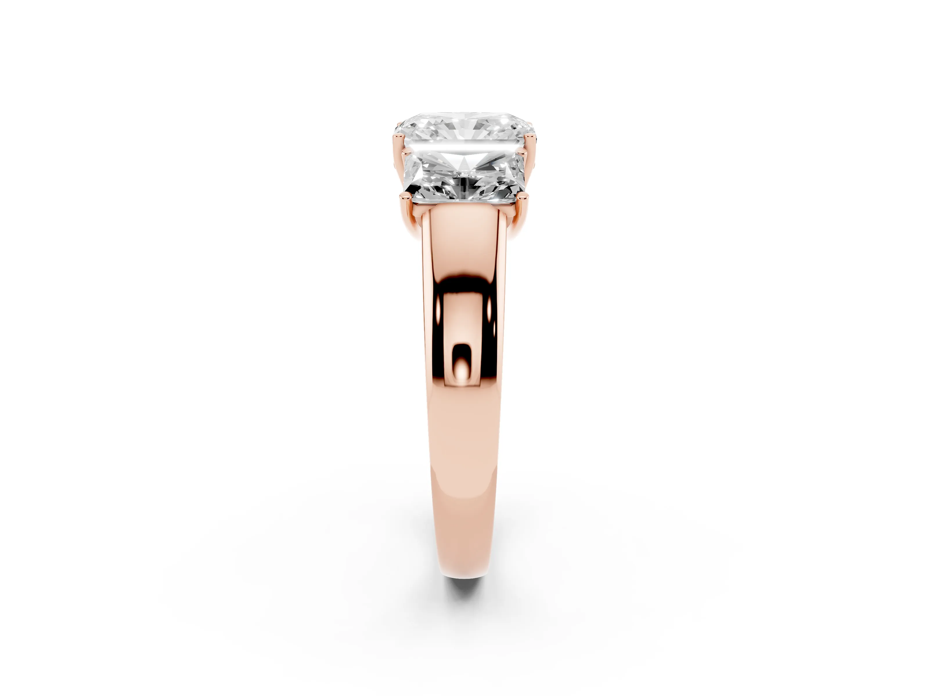 Three-Stone Radiant Cut Diamond Ring Set in Rose gold with Matching Prong Settings and Plain Band