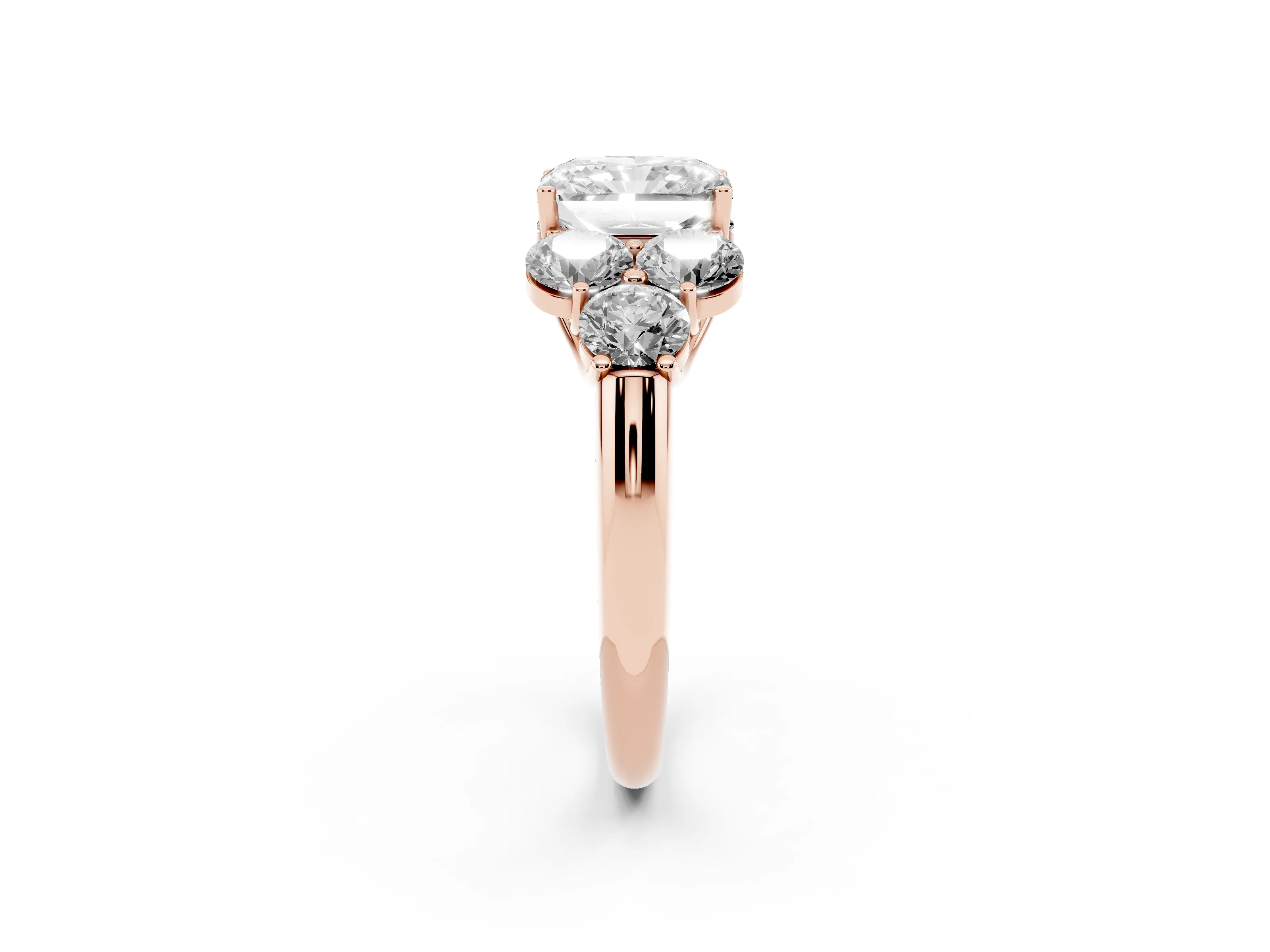 Radiant Cut Diamond Cluster Ring Set in Rose gold with Round Accent Stones and Prong Setting on a Plain Band