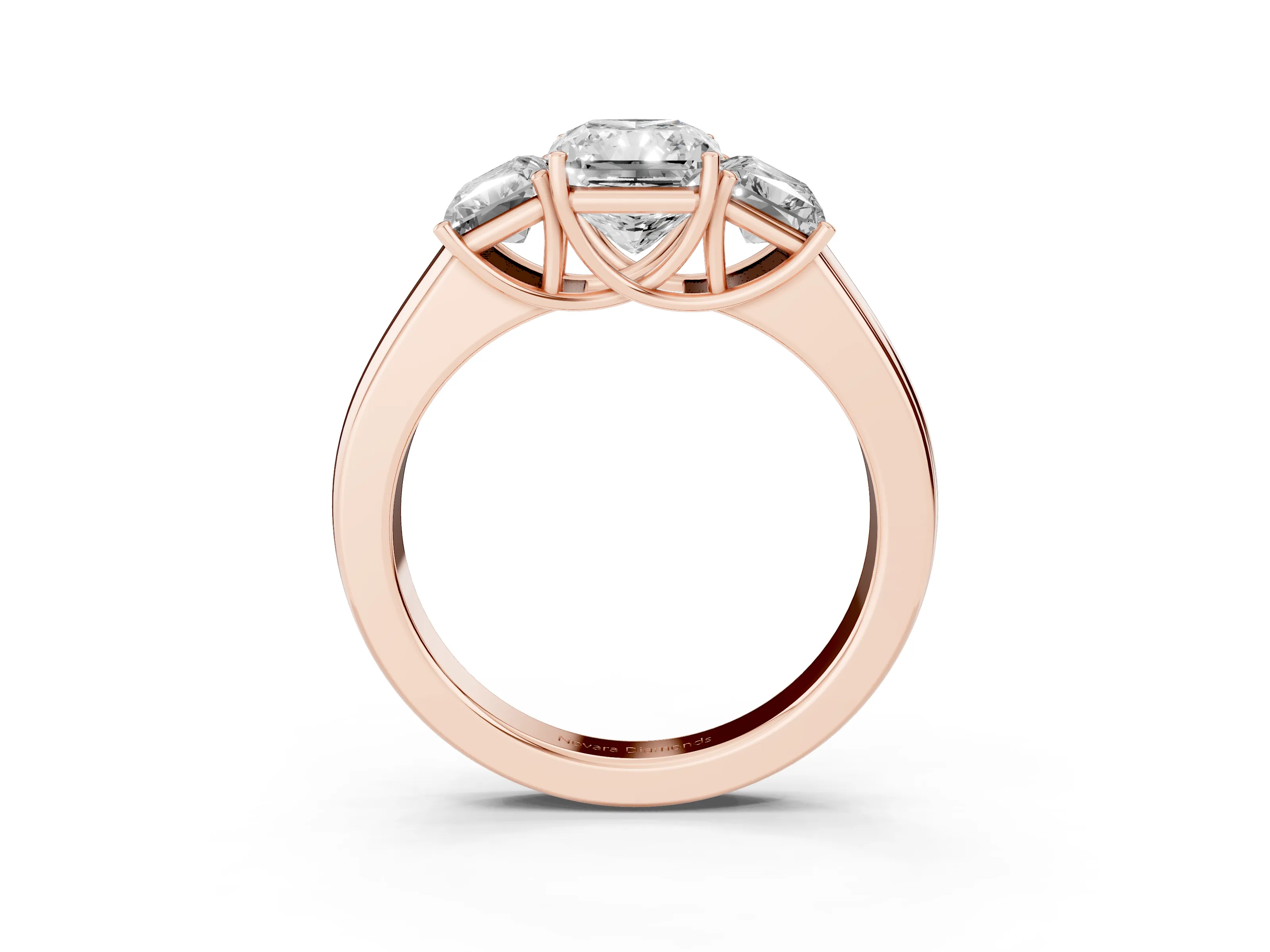 Three-Stone Radiant Cut Diamond Ring Set in Rose gold with Matching Prong Settings and Plain Band