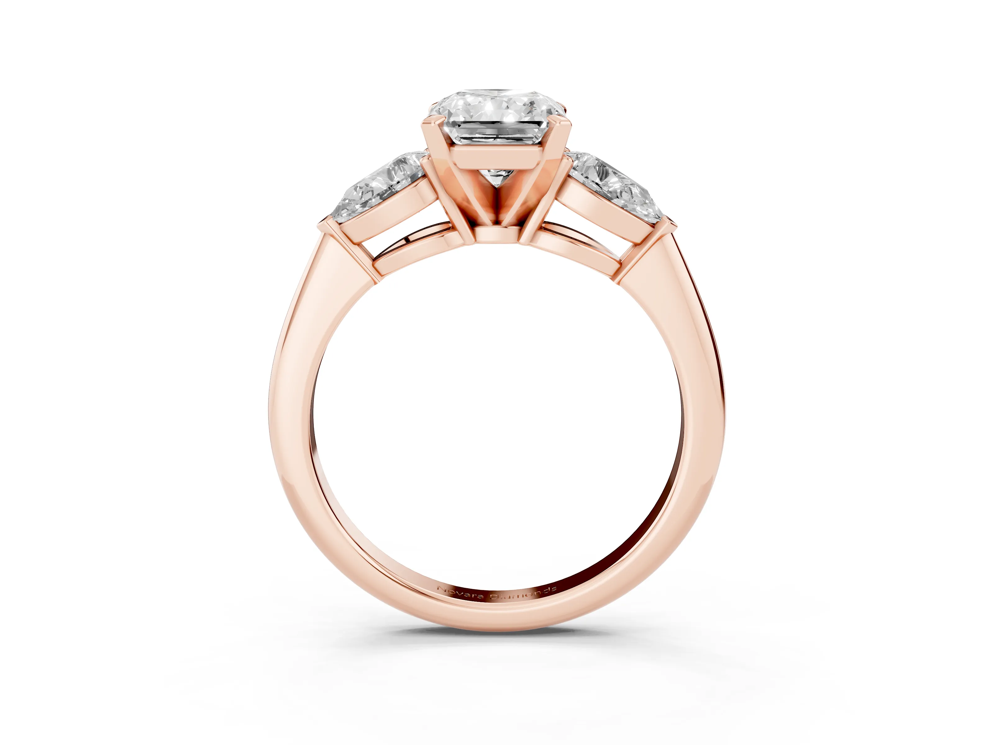 Three-Stone Radiant Cut Diamond Ring Set in Rose gold with Pear Side Stones and Prong Setting