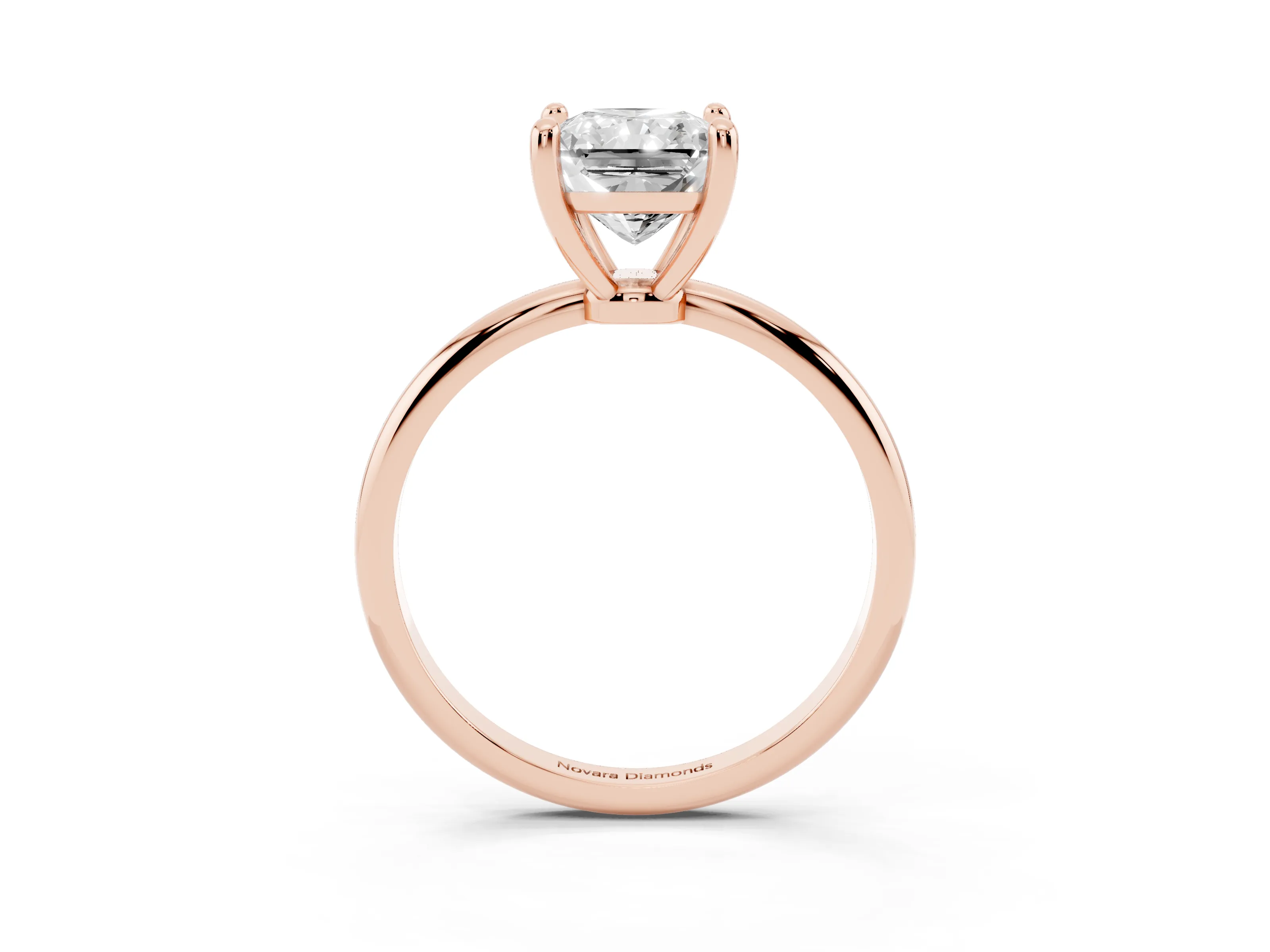 Radiant Cut Diamond Solitaire Ring Set in Rose gold with Secure Prong Setting on a Classic Band