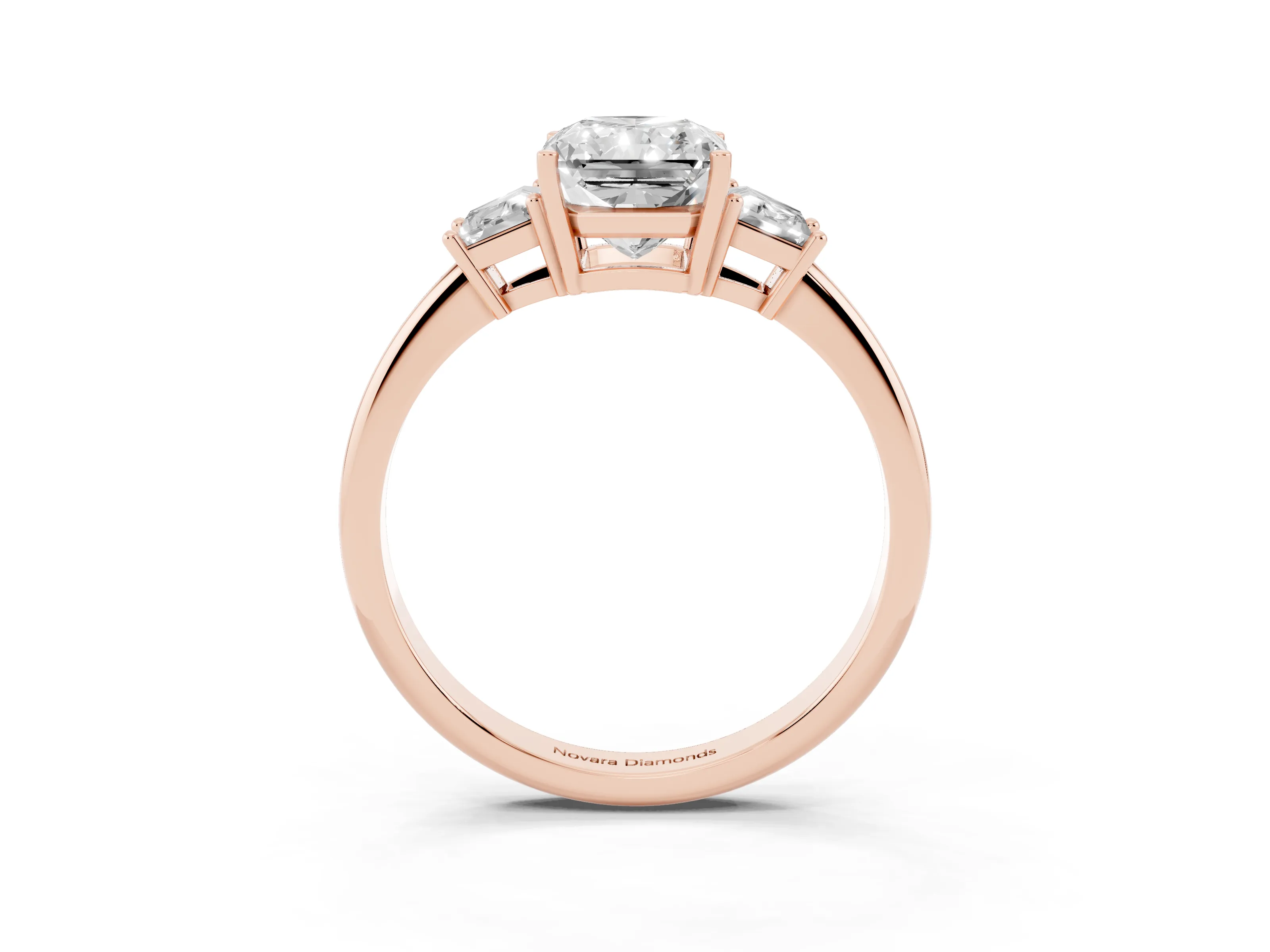 Radiant Cut Diamond Three-Stone Ring Set in Rose gold with Trapezoid Side Stones and Prong Setting