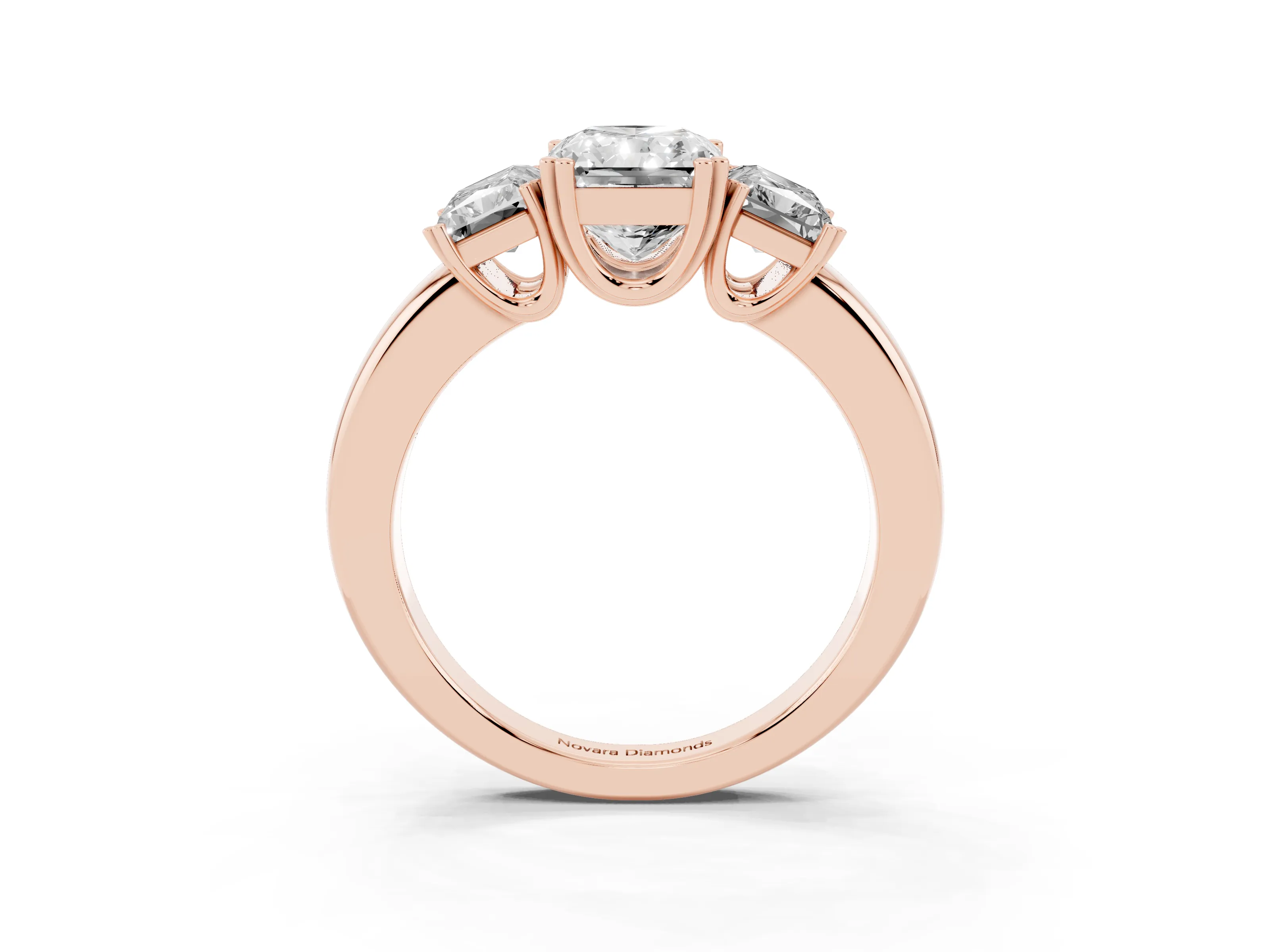 Radiant Cut Diamond Three-Stone Ring Set in Rose gold with Polished Channel-Set Band