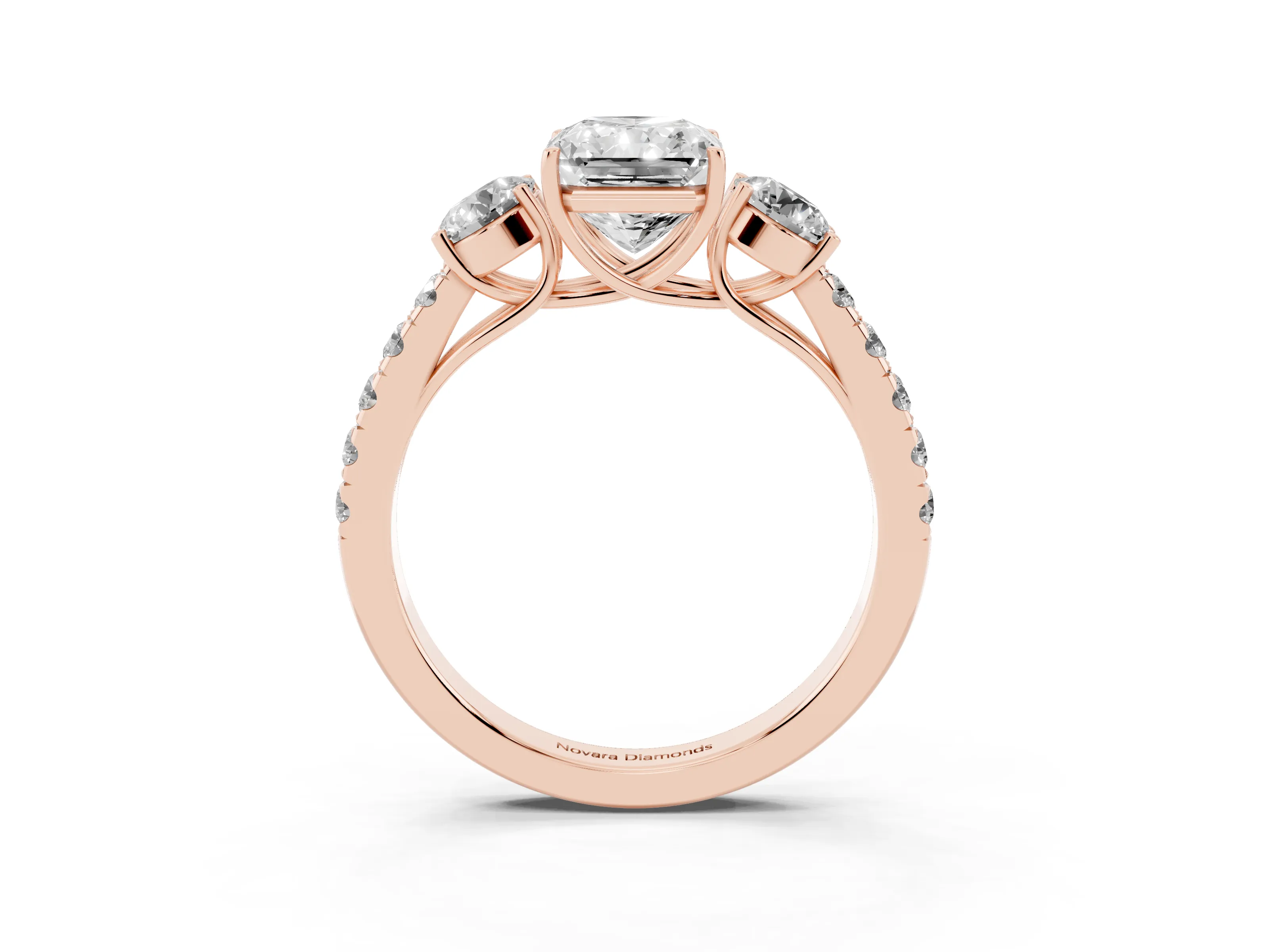 Radiant Cut Diamond Three-Stone Ring Set in Rose gold with Round Side Stones and Delicate Pavé Band
